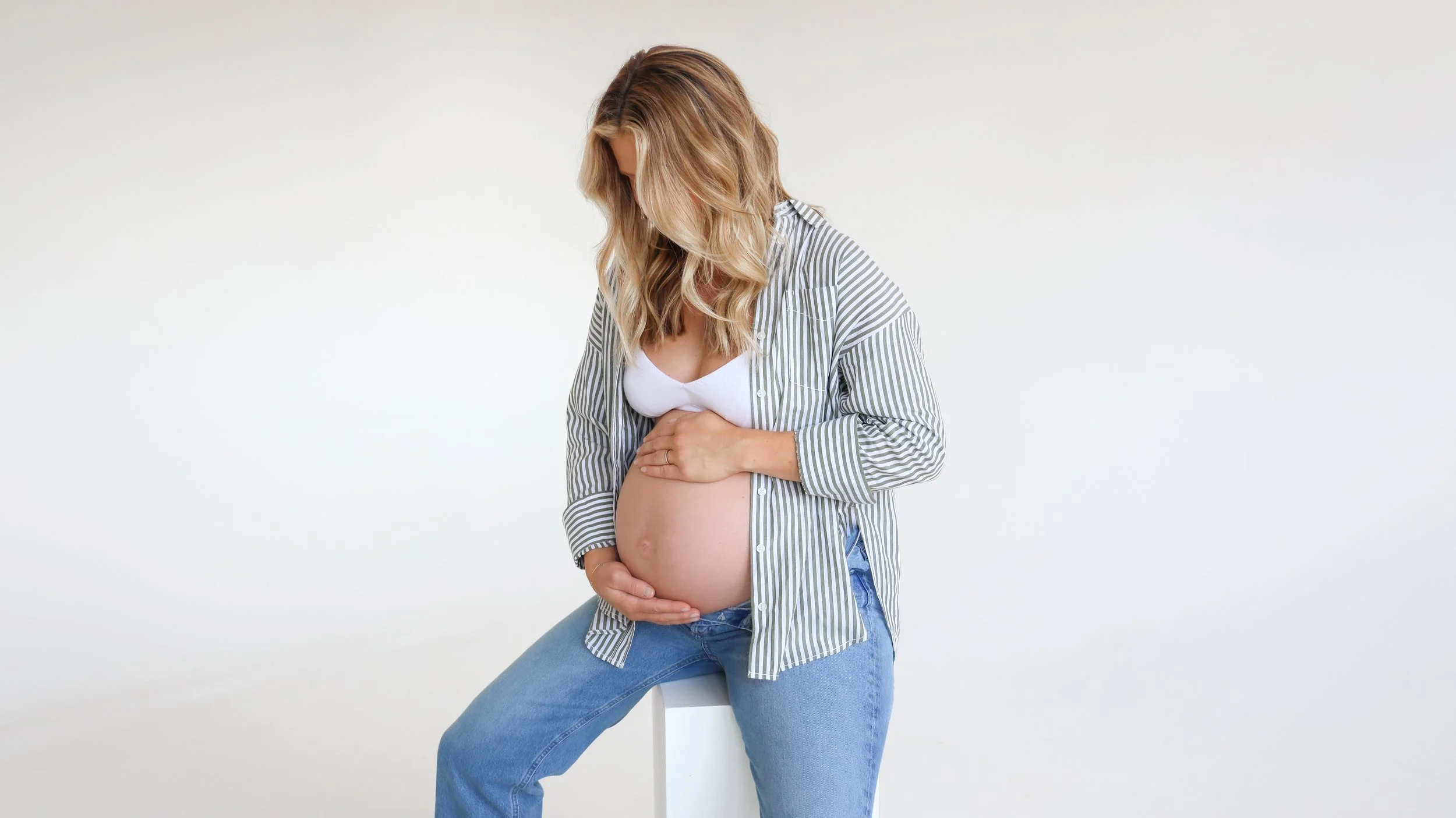 Dove Maternity Photography Session by Nicole Schmiedl at Realm in Denver, CO 