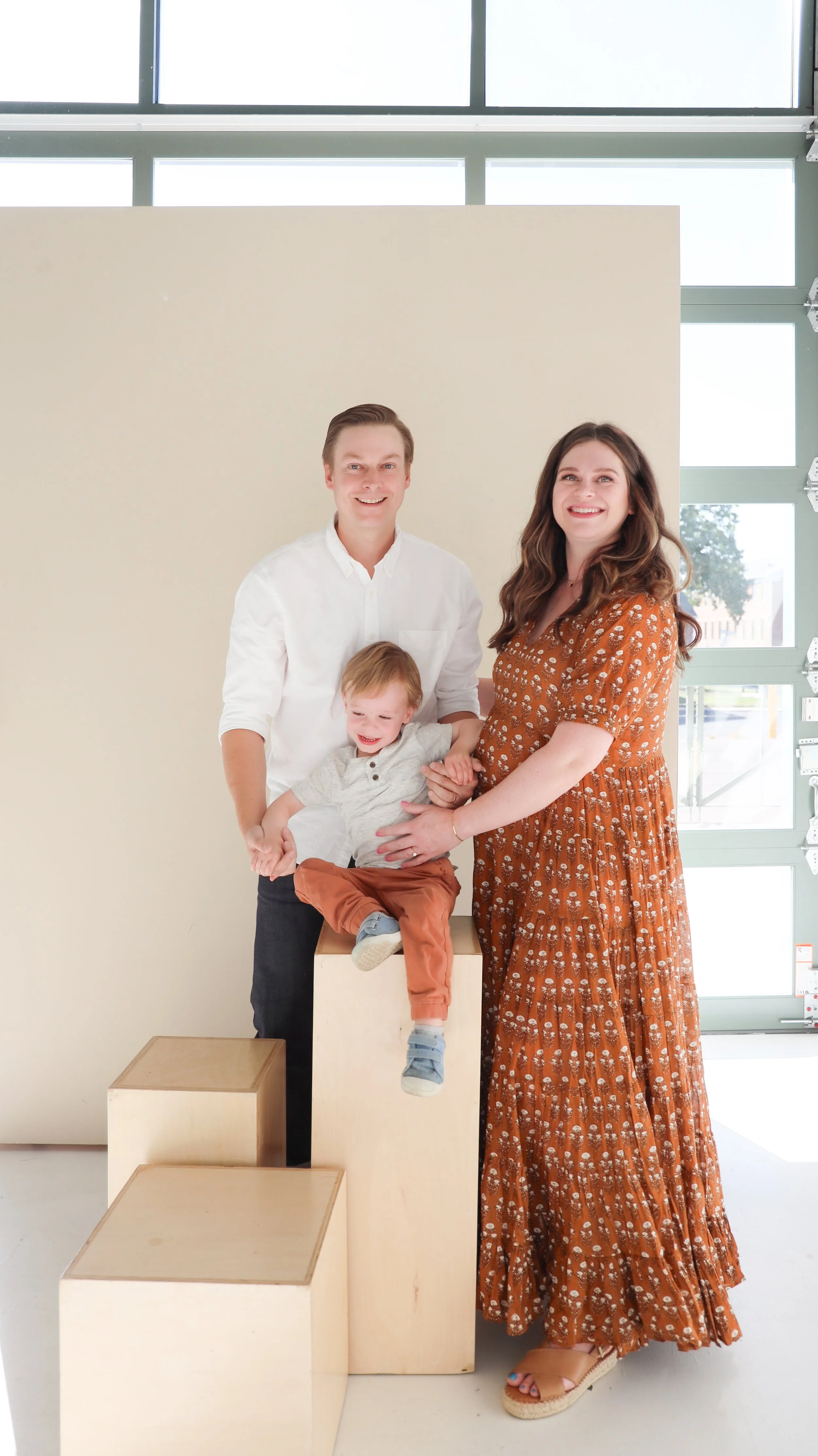 Youngblade family, captured in beautiful maternity photos, eagerly expanding to four. Precious moments in family and maternity photography."