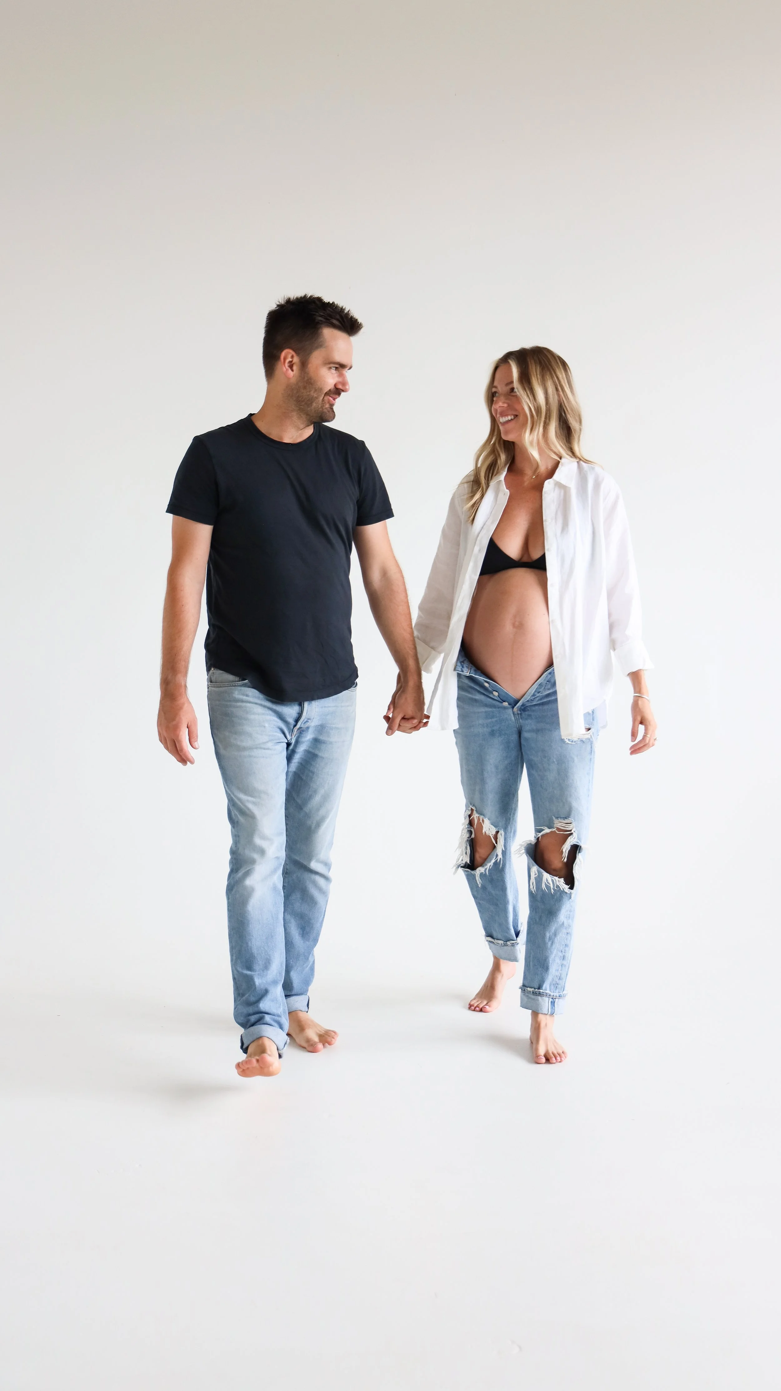 Celebrate the Middleton's journey into parenthood with stunning maternity photography at Realm Studio in Denver, CO, expertly captured by Nicole Schmiedl.