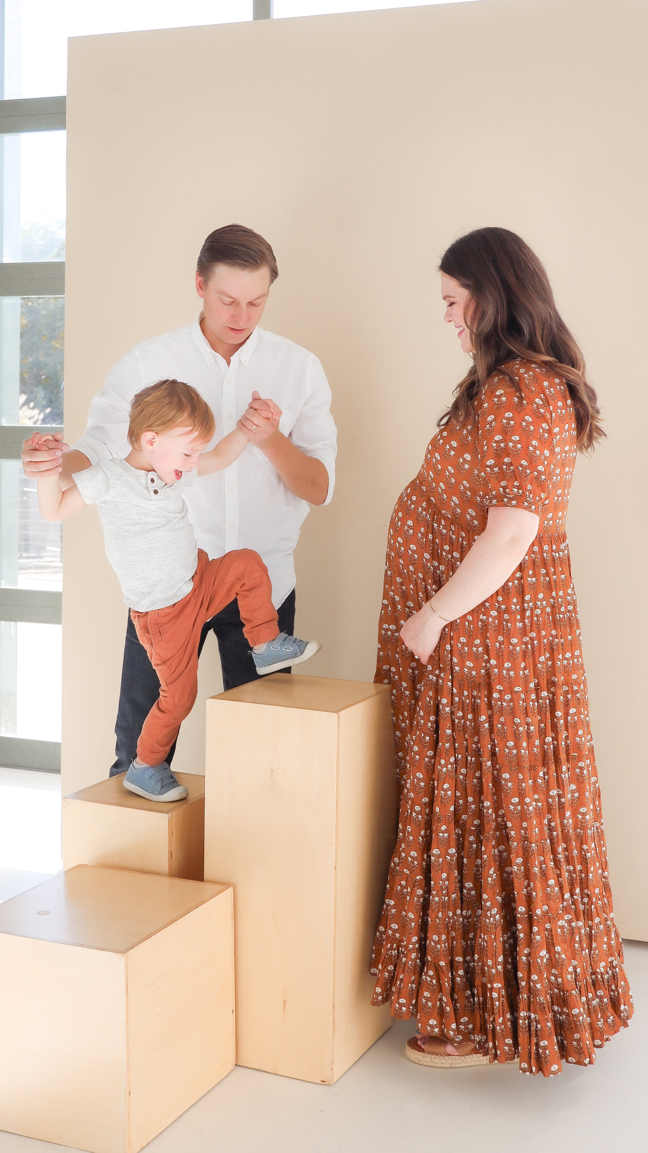 Youngblade family, captured in beautiful maternity photos, eagerly expanding to four. Precious moments in family and maternity photography."