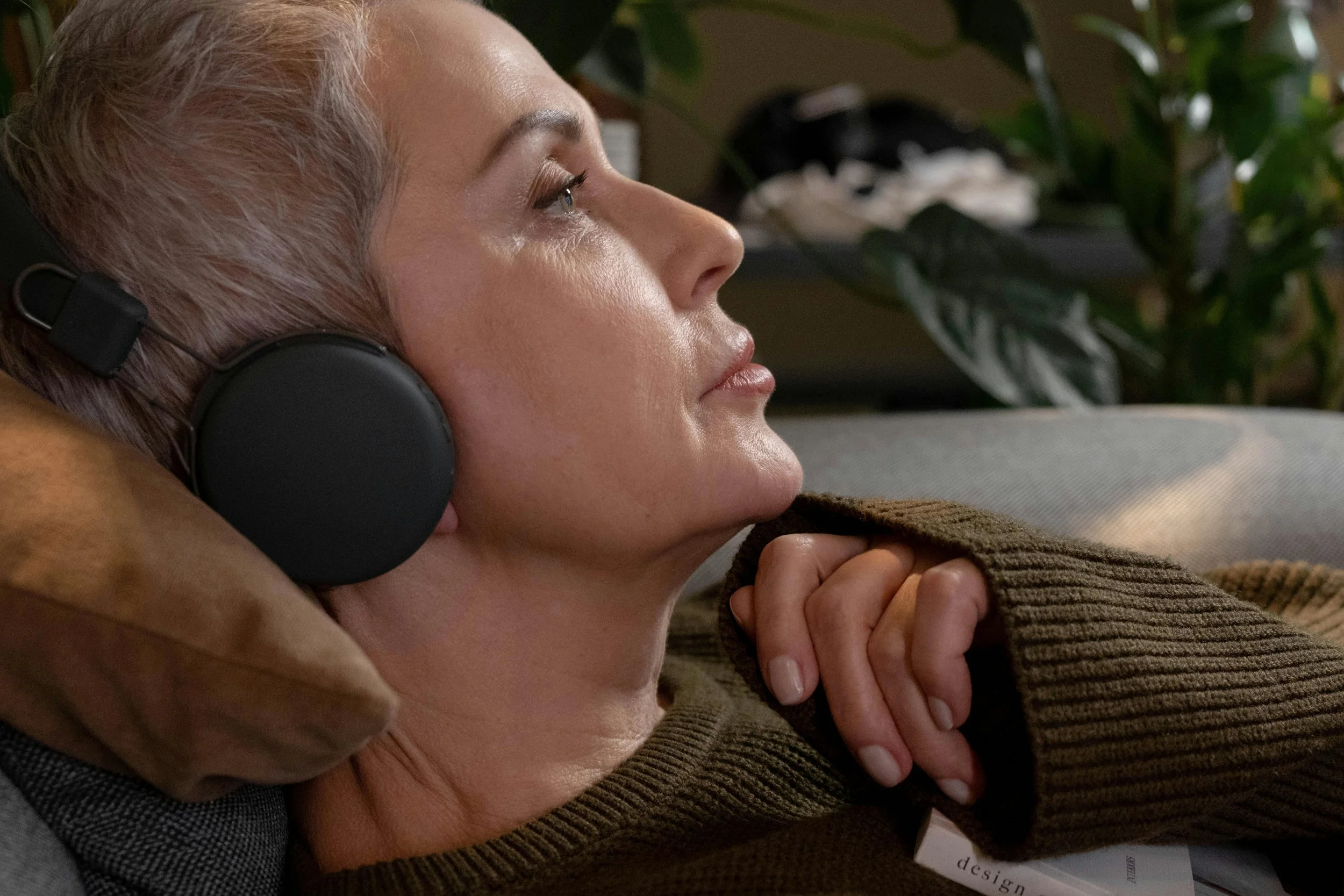 Woman resting with headphones enjoying music