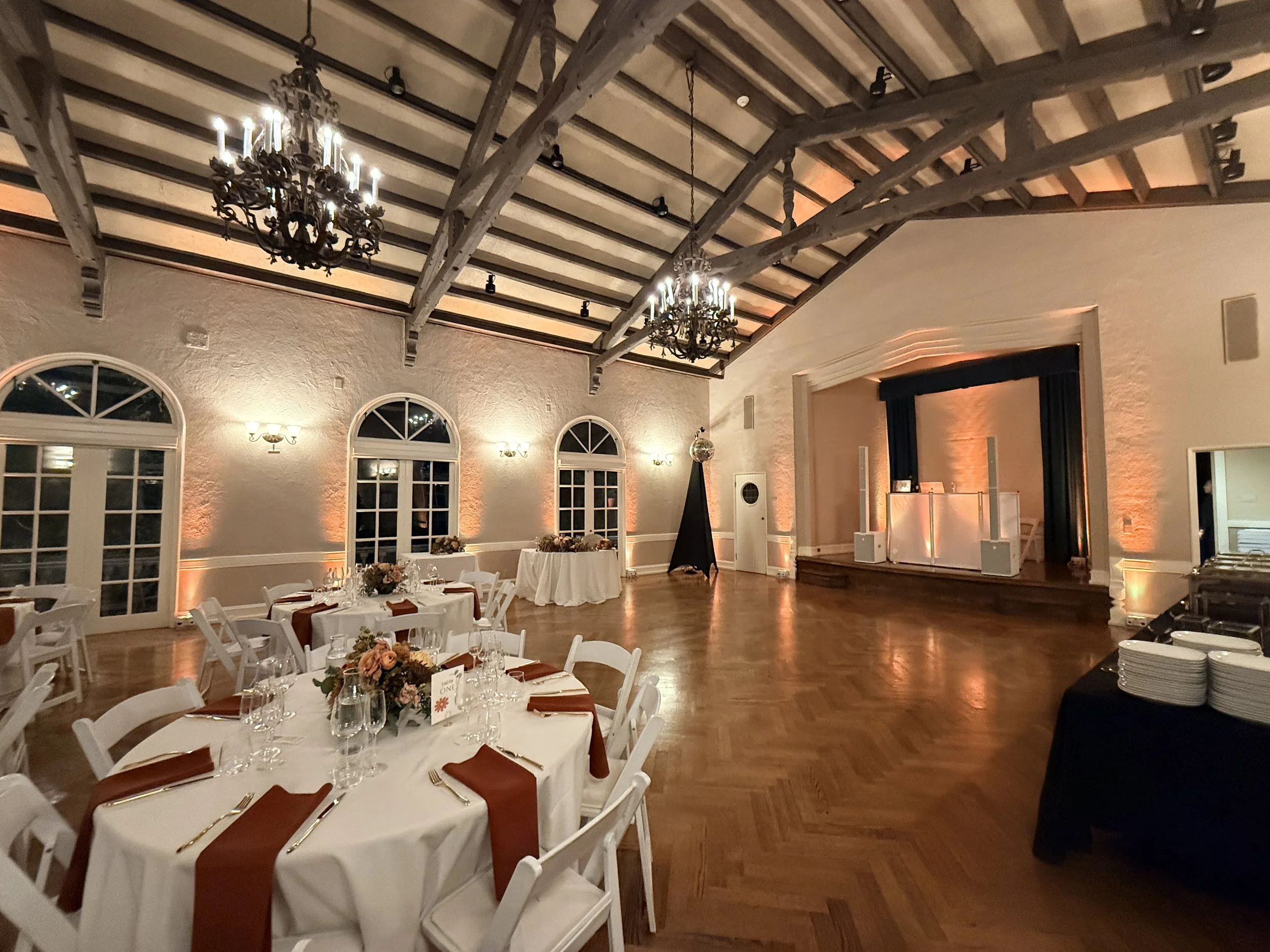 Wide view of Fog City Entertainment DJ booth at a destination wedding reception.