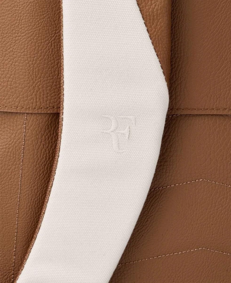 WR8054801_11_RF_LAWN_COLLECTION_TENNIS_BACKPACK_Cream_Leather.png.cq5dam.web.1200.1200.jpeg