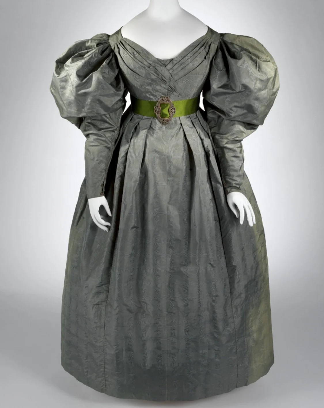 What happens when you start with a single gown and try to imagine the whole ensemble it once belonged to? 

I began with a watered moir&eacute; silk dress from 1831 &mdash; all shimmering surface and unapologetically vast sleeves. Its fine belt, comp