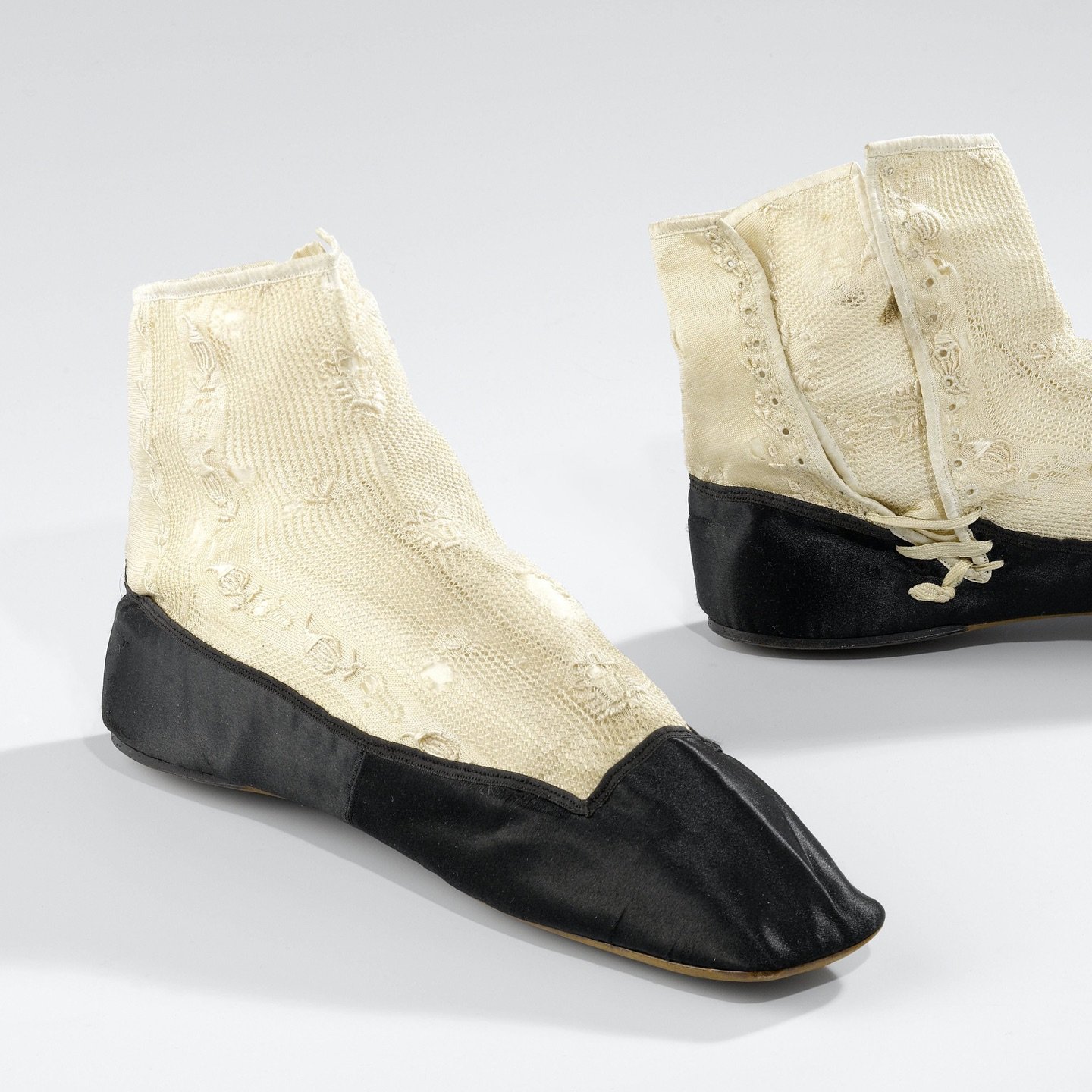 These little boots from the Rijksmuseum are such a joy. They look like neat knitted lace gaiters at first glance, but they&rsquo;re actually something far more interesting. For under the silk‑tricot upper is a pair of satin pumps. The original shoe h