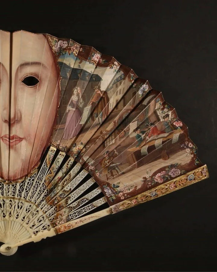 Fans of the mid‑eighteenth century often present themselves as polite little objects, even though the people who used them communicated far more than good manners. 

This 1745 example from @metmuseum seems normal enough at first glance, but a closer 