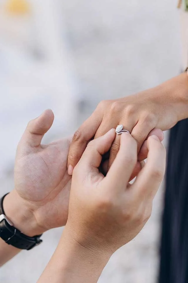 August Bespoke Proposal in Beach In Italy Pear Engagement Ring.jpeg