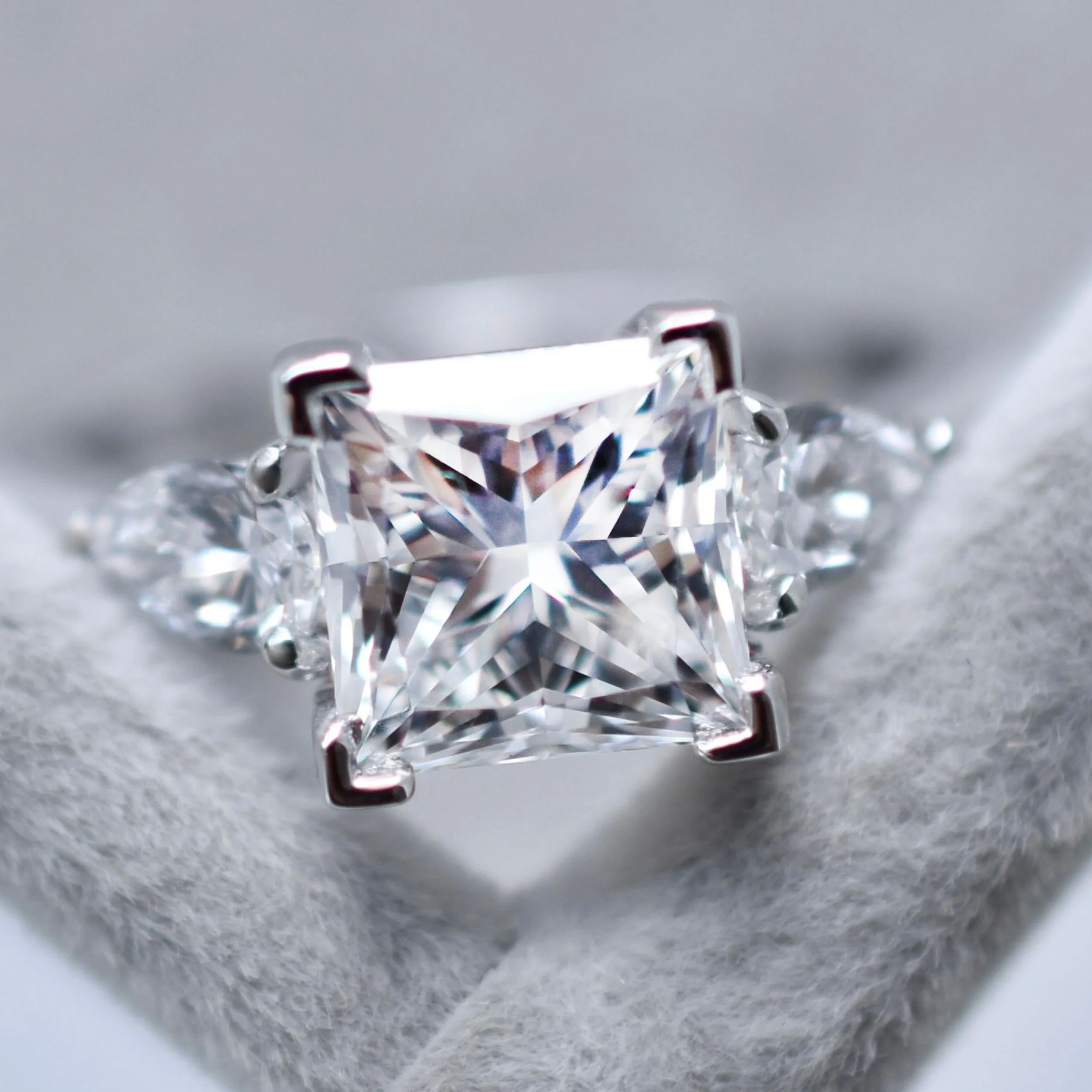 Elice Princess Cut Diamond Ring with Pear Side Stones in White Gold 1.jpg