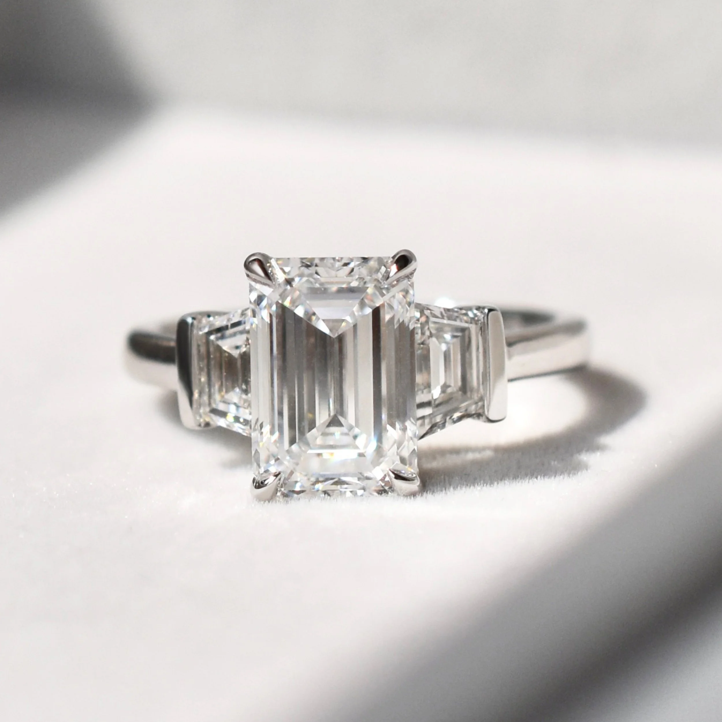Beverly Emerald Cut Three-stone Diamond Ring with Trapezoids 2.jpg