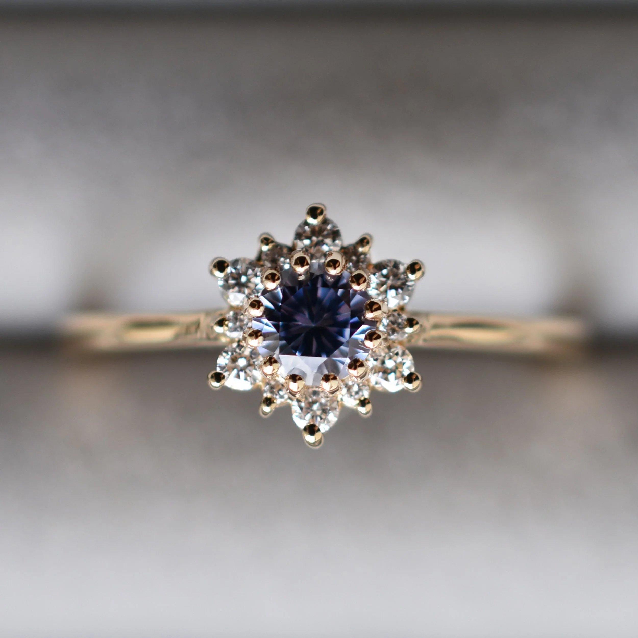 Adele Starburst Sapphire Ring in Yellow Gold 2.jpg