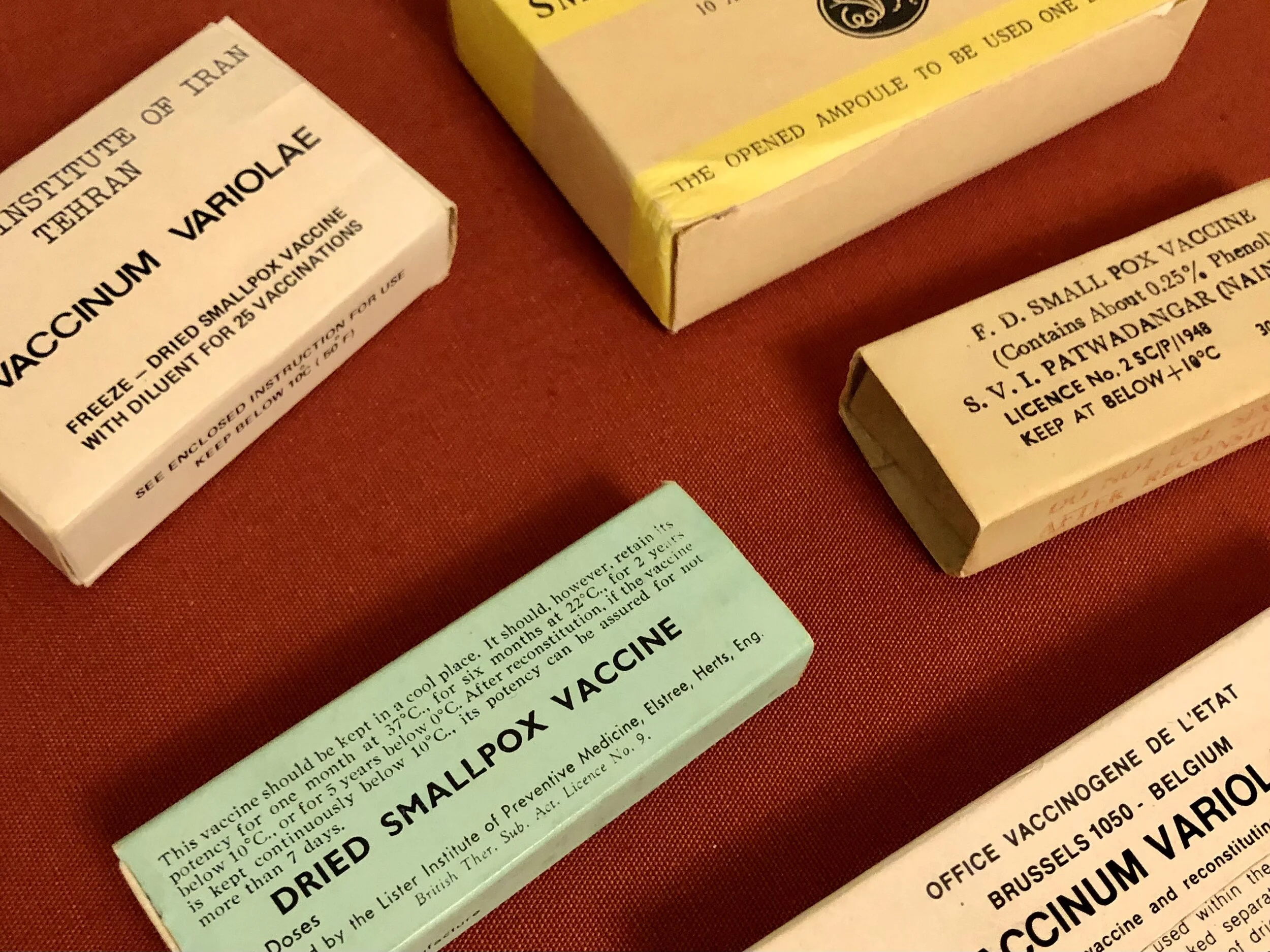 Freeze-dried smallpox vaccine manufactured in (clockwise from top left) Iran, USSR, India, Belgium, UK (© The Jenner Trust)