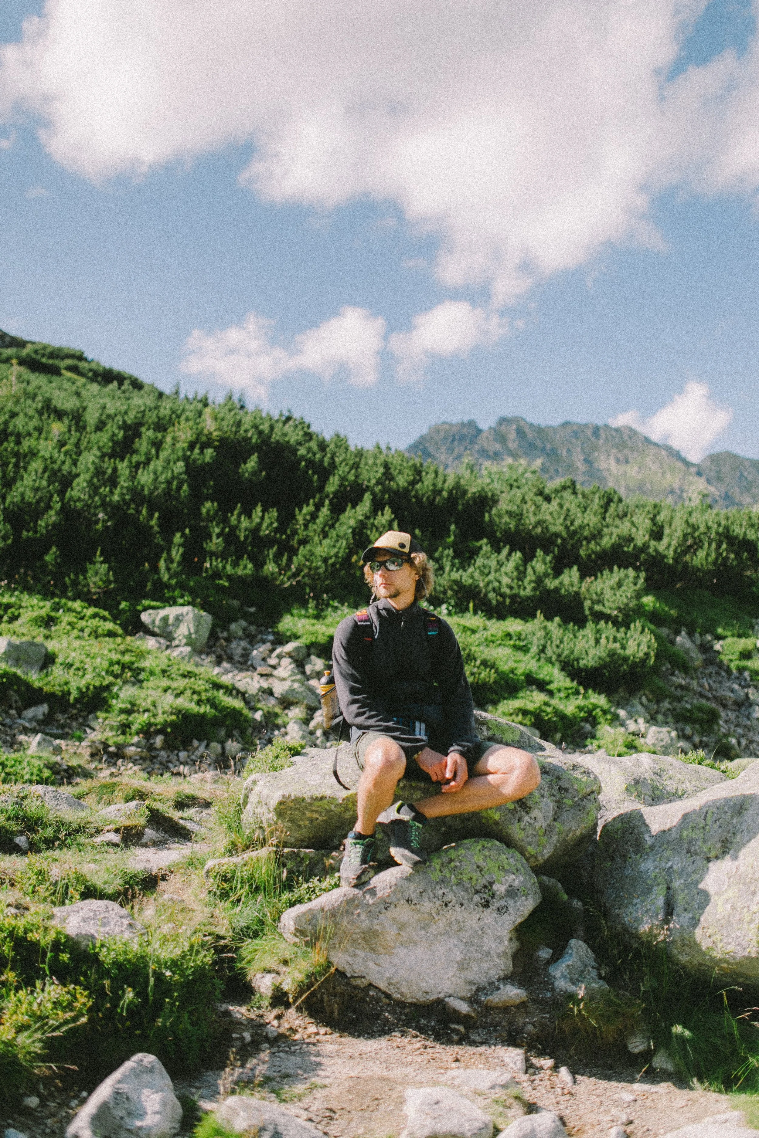 pexels-nataliya-vaitkevich-5291520-person sitting on rocks in the forest.jpg