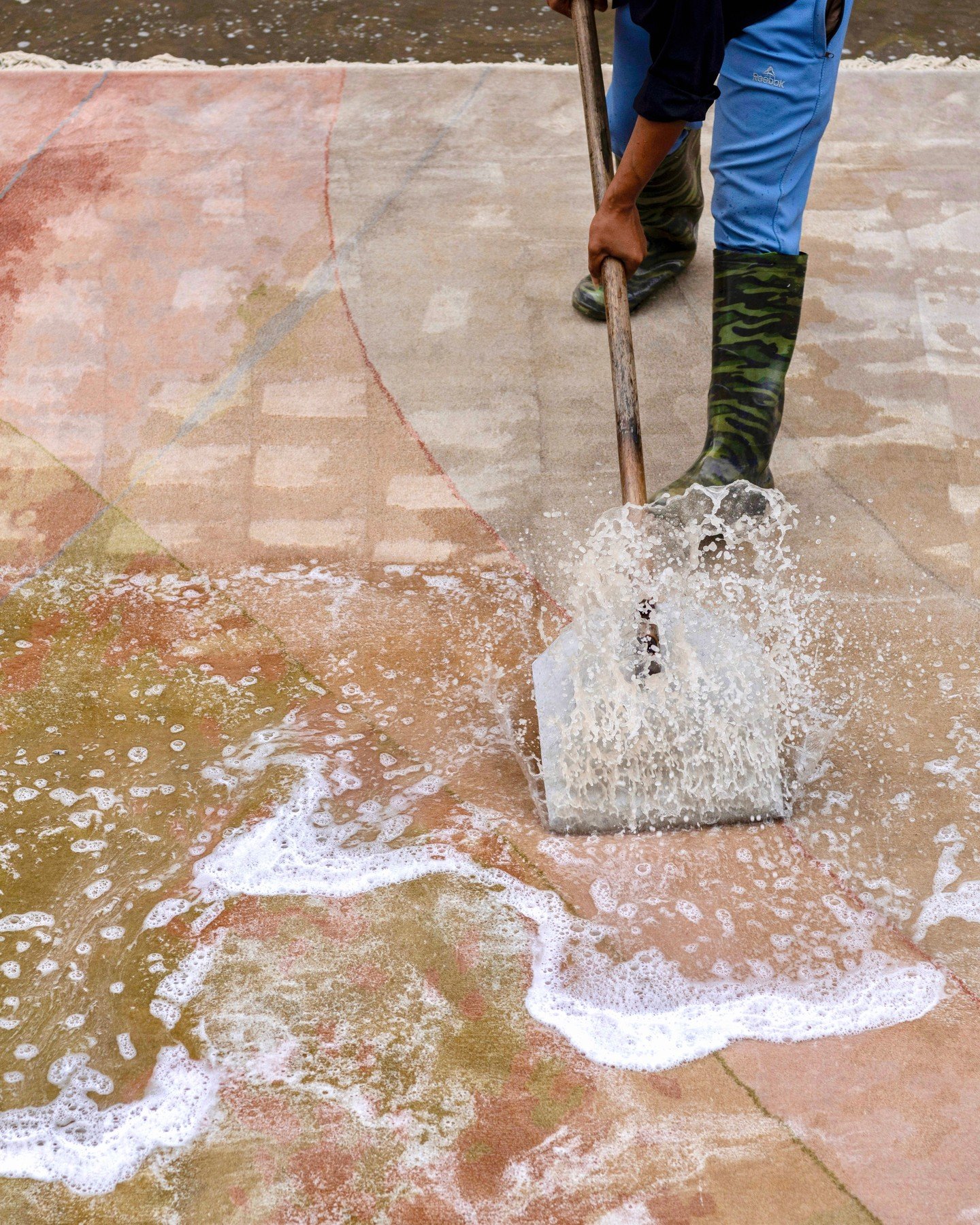 Each rug is shaped by many hands, with craftsmanship and intention woven into every thread. The washing stage reveals the material's character, softening, settling and drawing out the depth of texture and design. It&rsquo;s a time-honoured process of