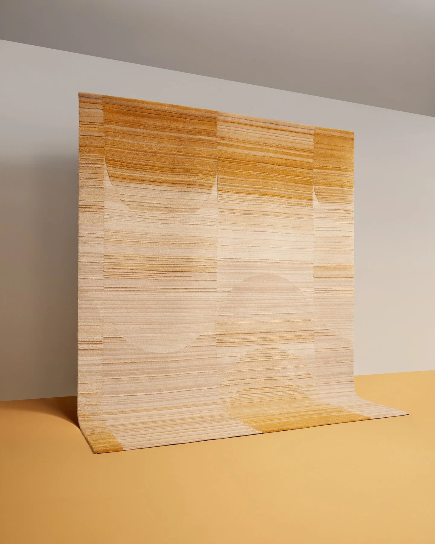 Obscura Goldenrod captures light in motion, its curves suggesting rhythm rather than pattern. ⁠
⁠
Handknotted in Nepal using Tibetan wool and Chinese silk, the rug balances softness and structure, inviting touch and reflection. ⁠
⁠
Discover Obscura -