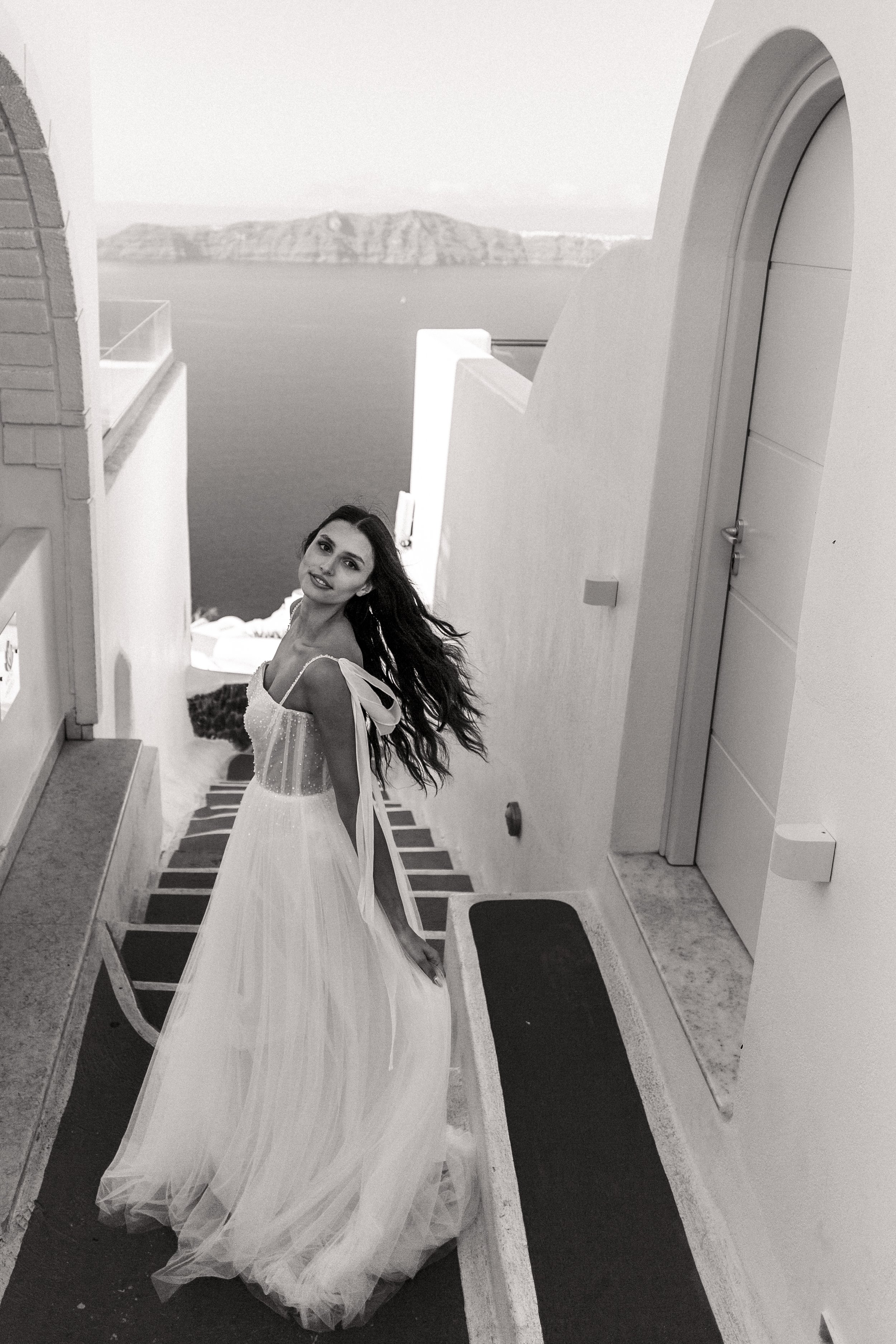 Bridal editorial photography in Santorini with Vera Wang, Pronovias and Dream by Savin