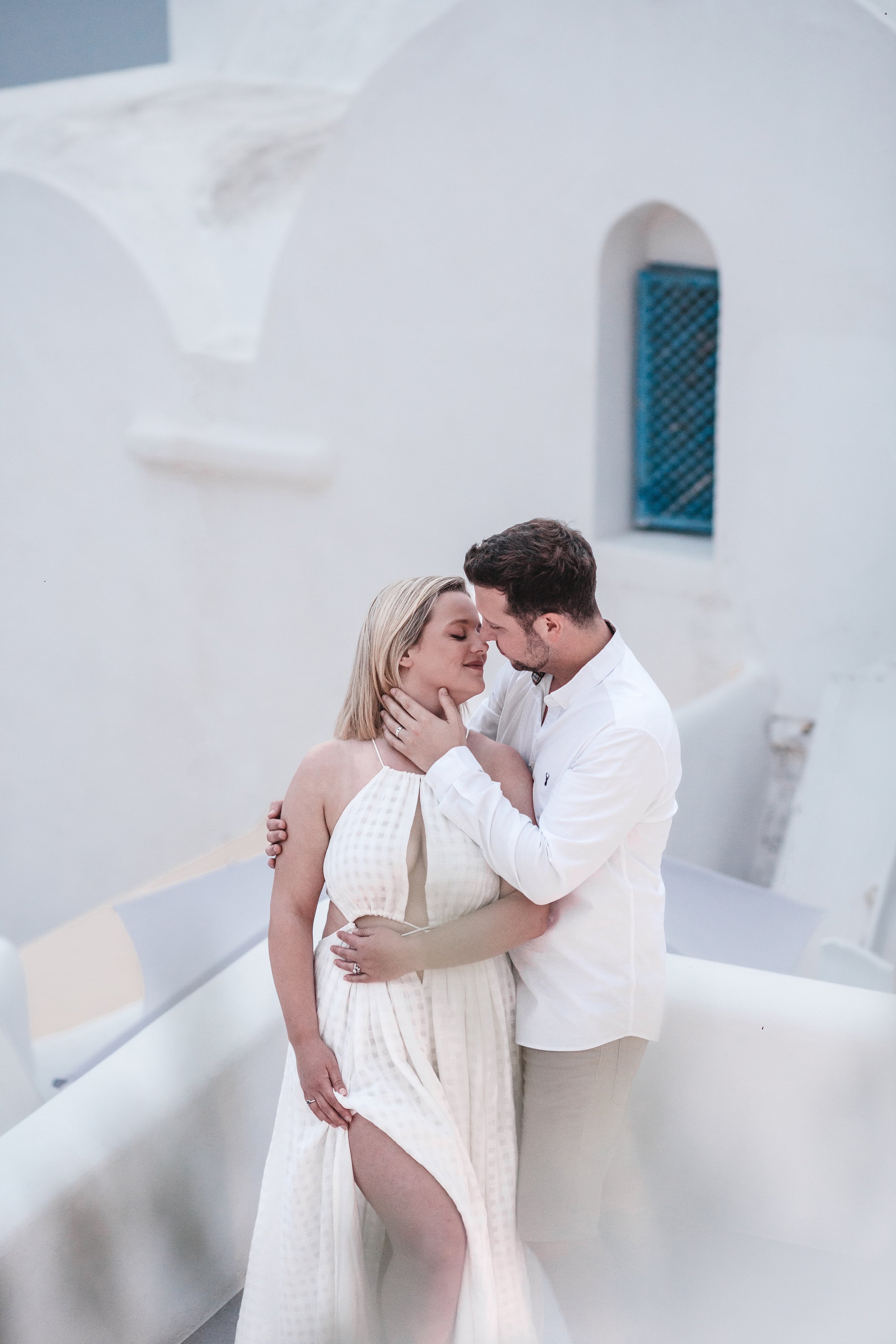 Wedding couple elopement by the blue dome churches of Santorini island, Greece