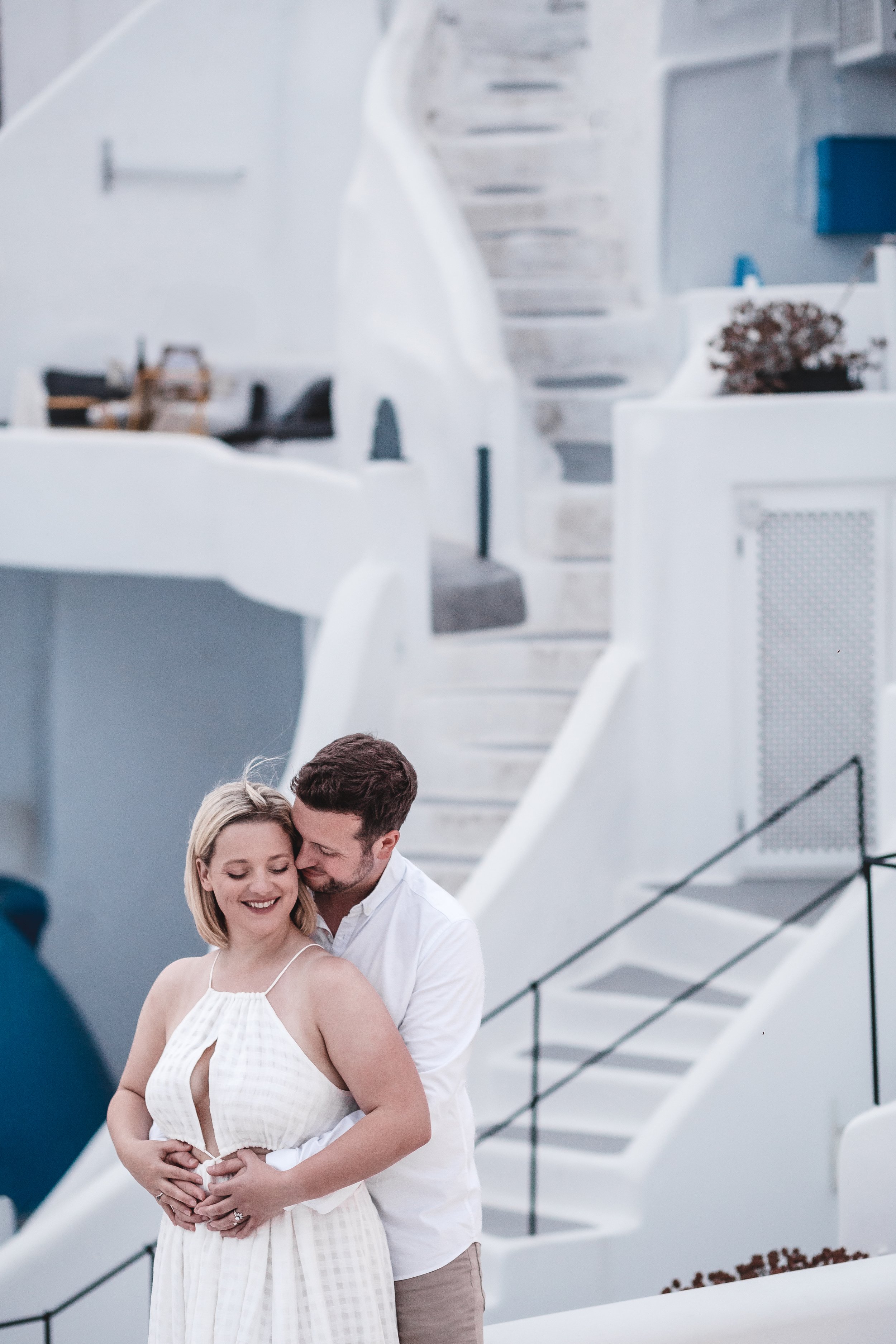 Wedding couple elopement by the blue dome churches of Santorini island, Greece