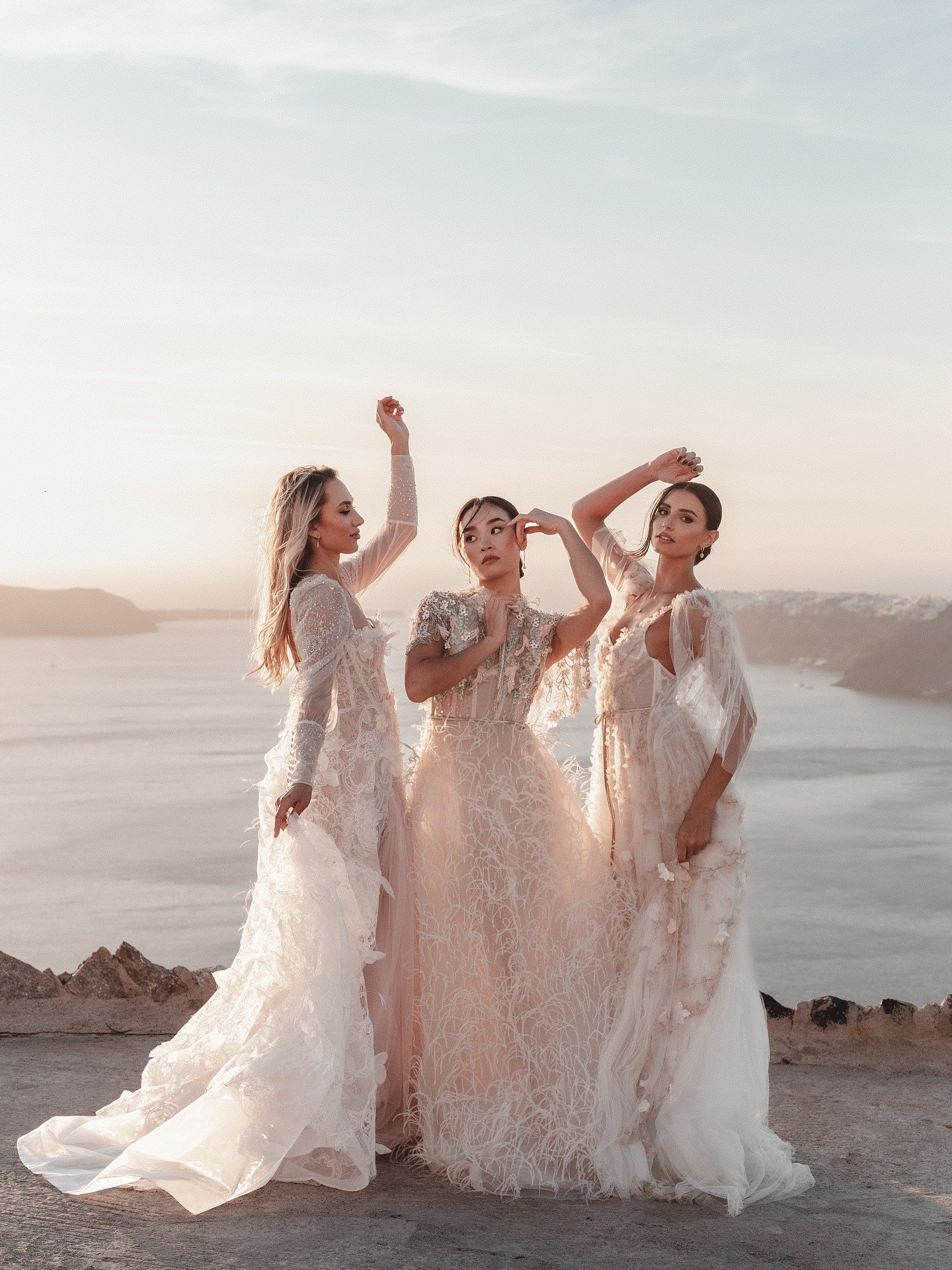 Golden hour at @lecielsantorini felt like stepping into a dream. Santorini&rsquo;s caldera behind us, soft breeze in the air and the most ethereal light wrapping around three incredible women in @madebride gowns that moved like poetry ✨

This group b