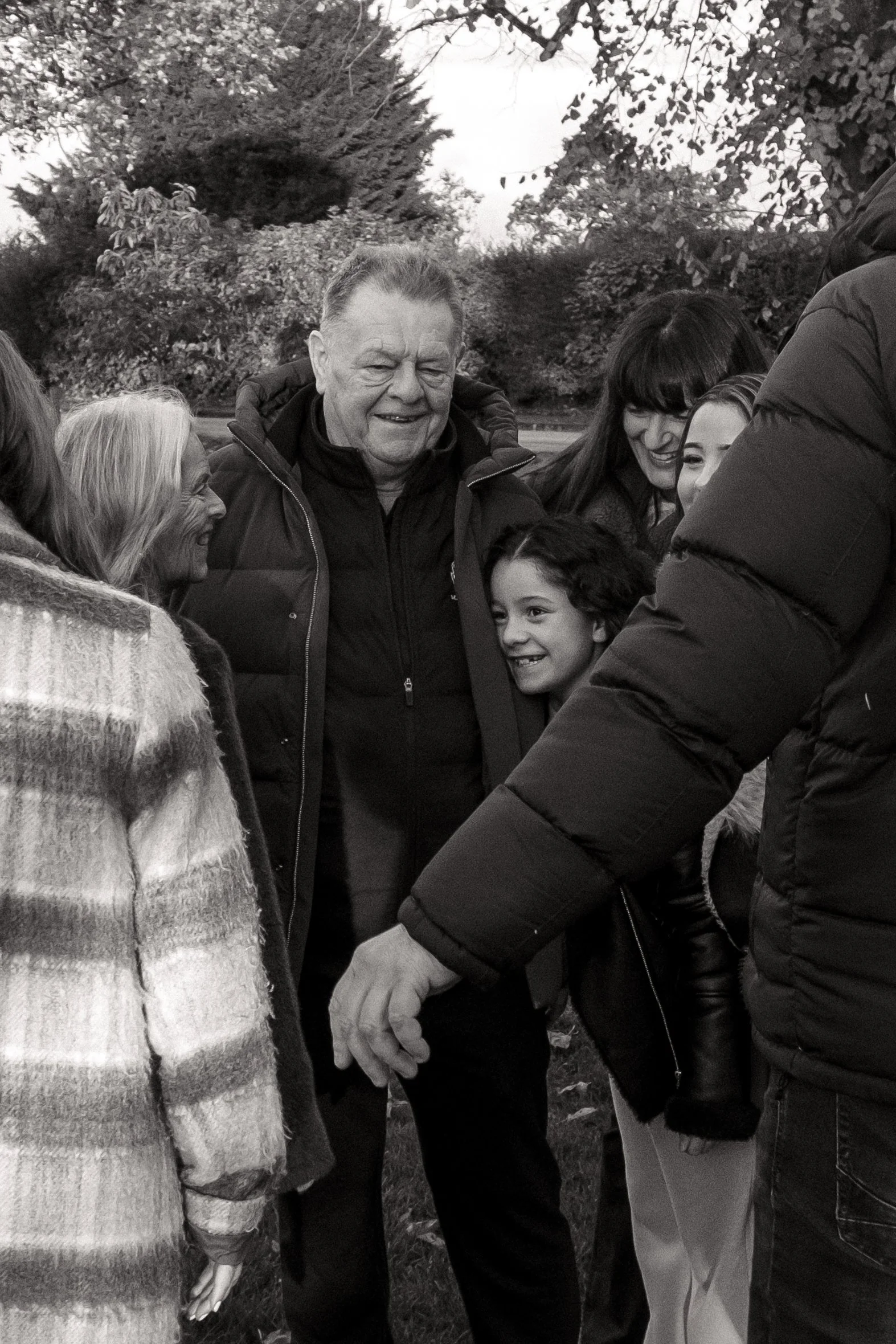 Older children and grandparents family portraits in Kingham in Oxfordshire. Cotswolds family portrait photographer. Autumn family photoshoot
