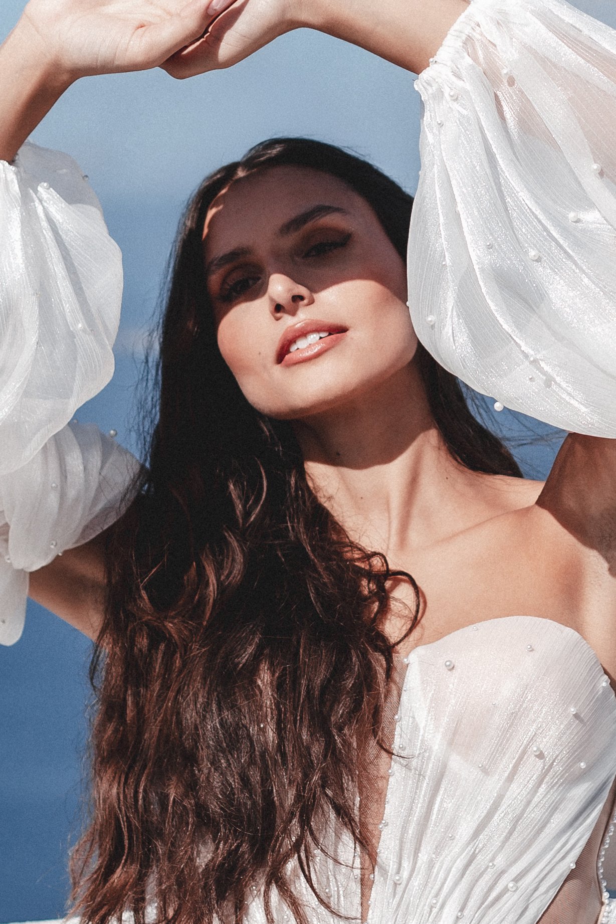 Bridal editorial photography in Santorini with Vera Wang, Pronovias and Dream by Savin