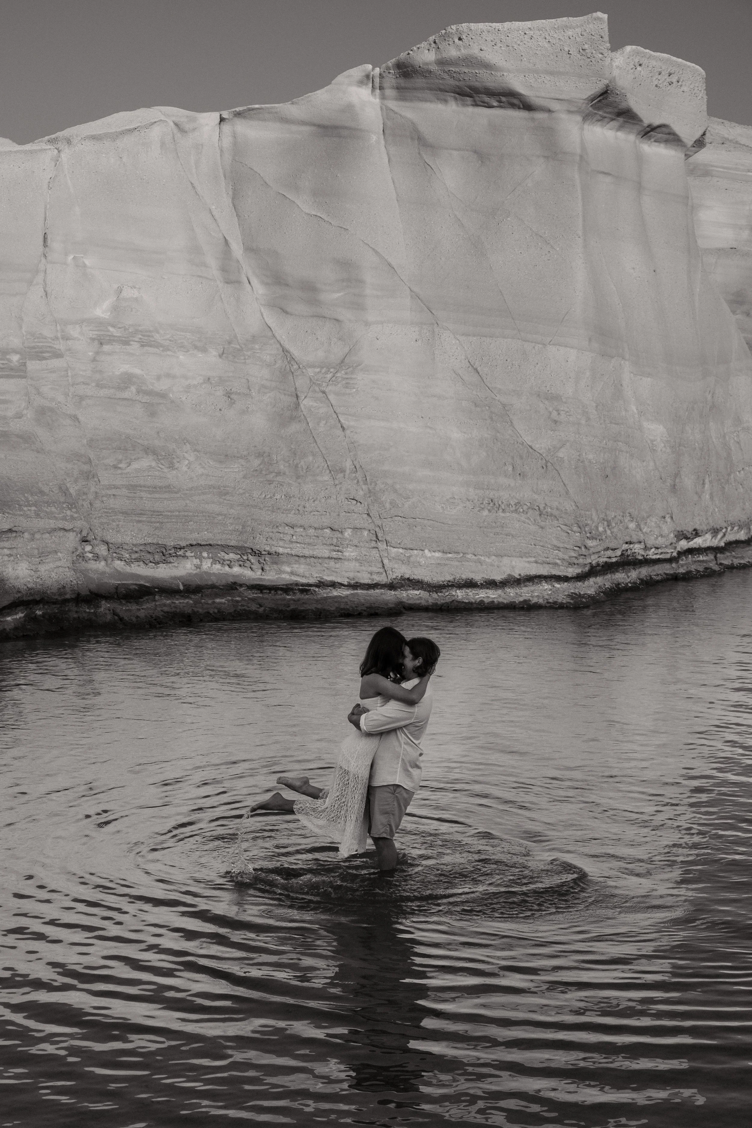 Couples engagement prewedding photoshoot in Milos, Greece. Cinematic and storytelling destination travel wedding photography