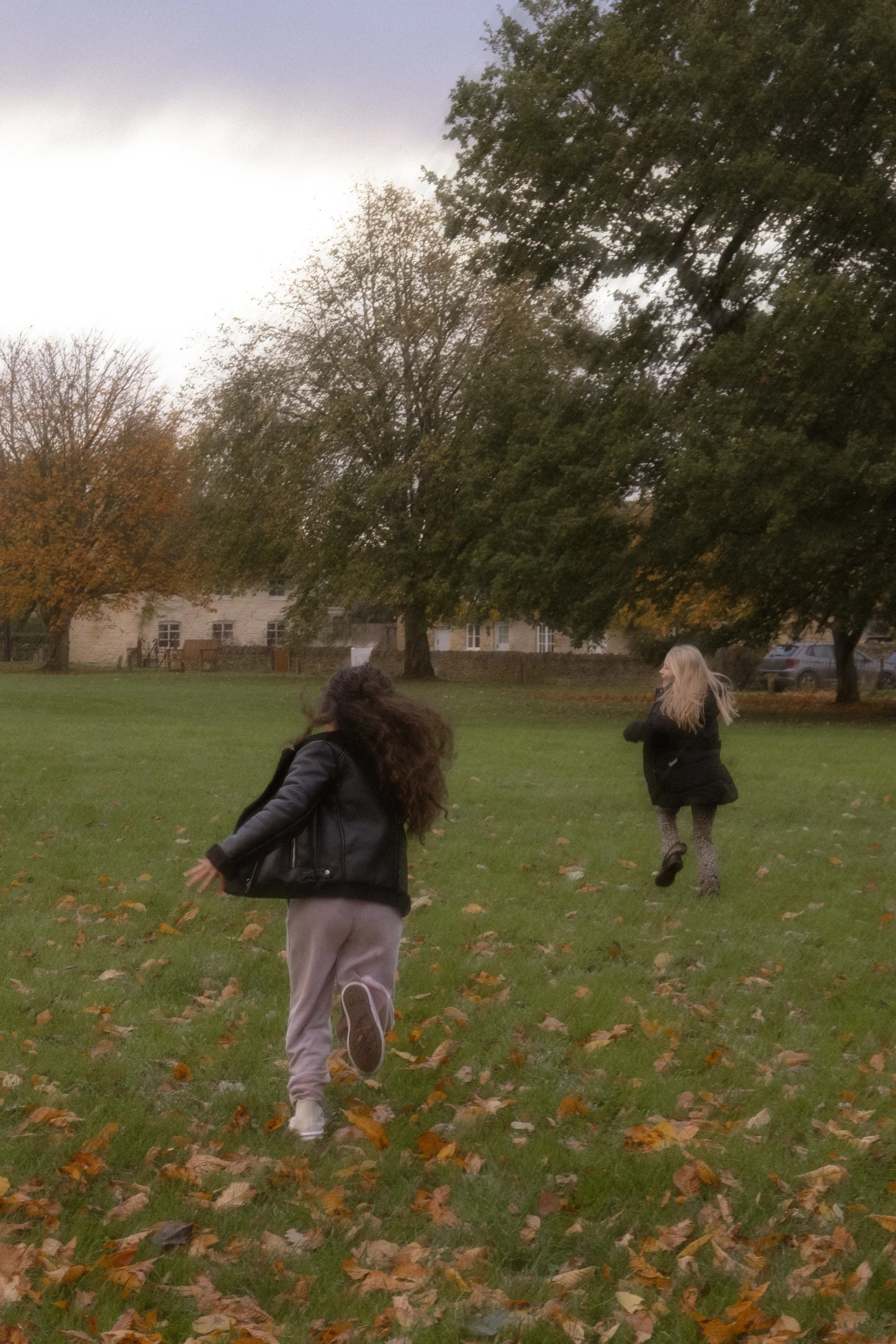 Older children and grandparents family portraits in Kingham in Oxfordshire. Cotswolds family portrait photographer. Autumn family photoshoot