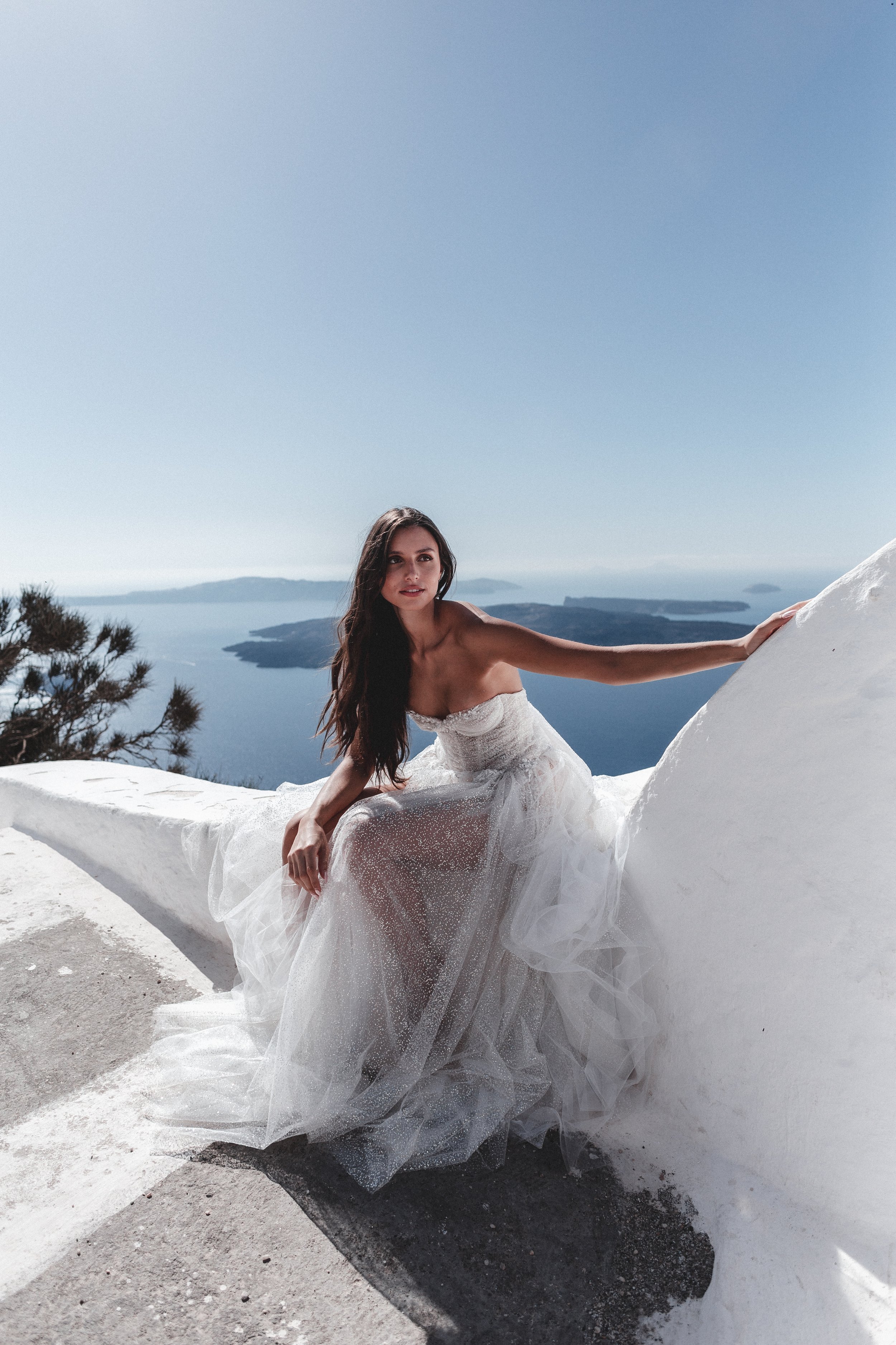 Bridal editorial photography in Santorini with Vera Wang, Pronovias and Dream by Savin