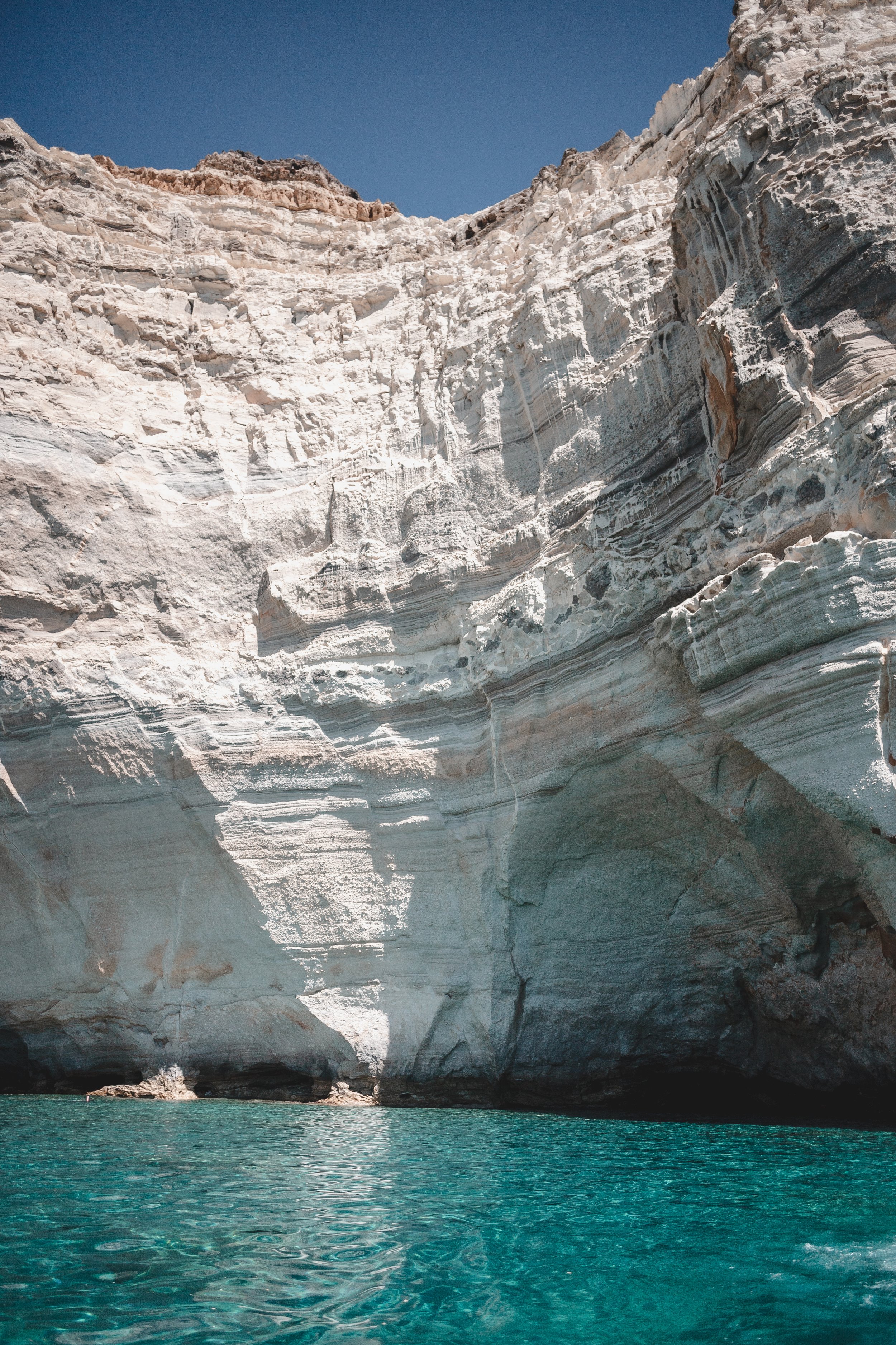 Adventure elopement on a yacht at Kleftiko in Milos, Greece