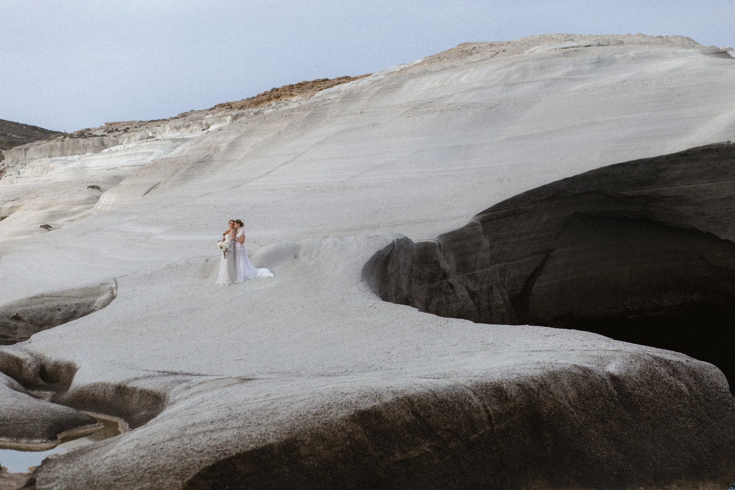 LGBT elopement on the island of Milos in Greece. Destination elopement photography