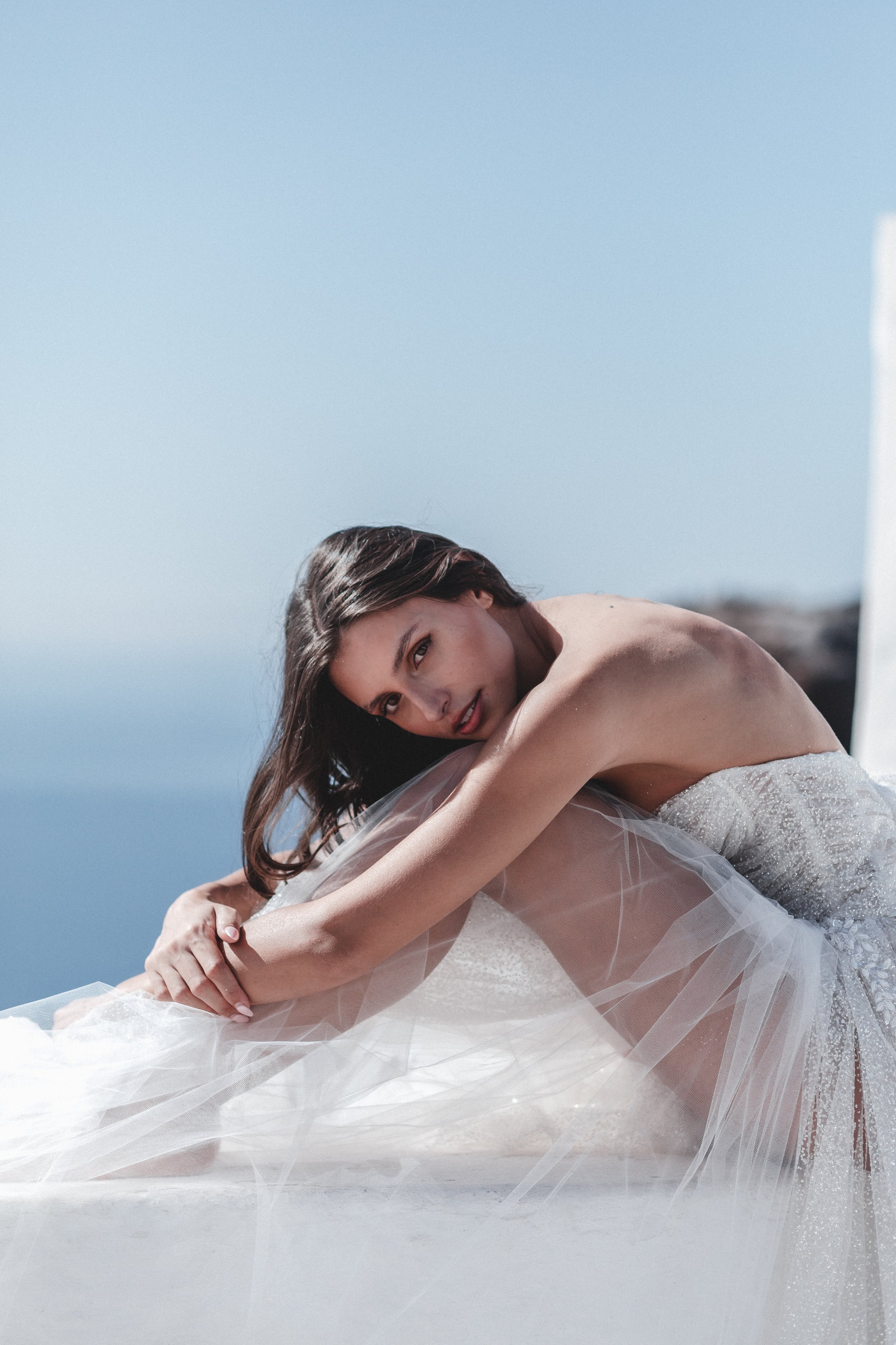 Bridal editorial photography in Santorini with Vera Wang, Pronovias and Dream by Savin