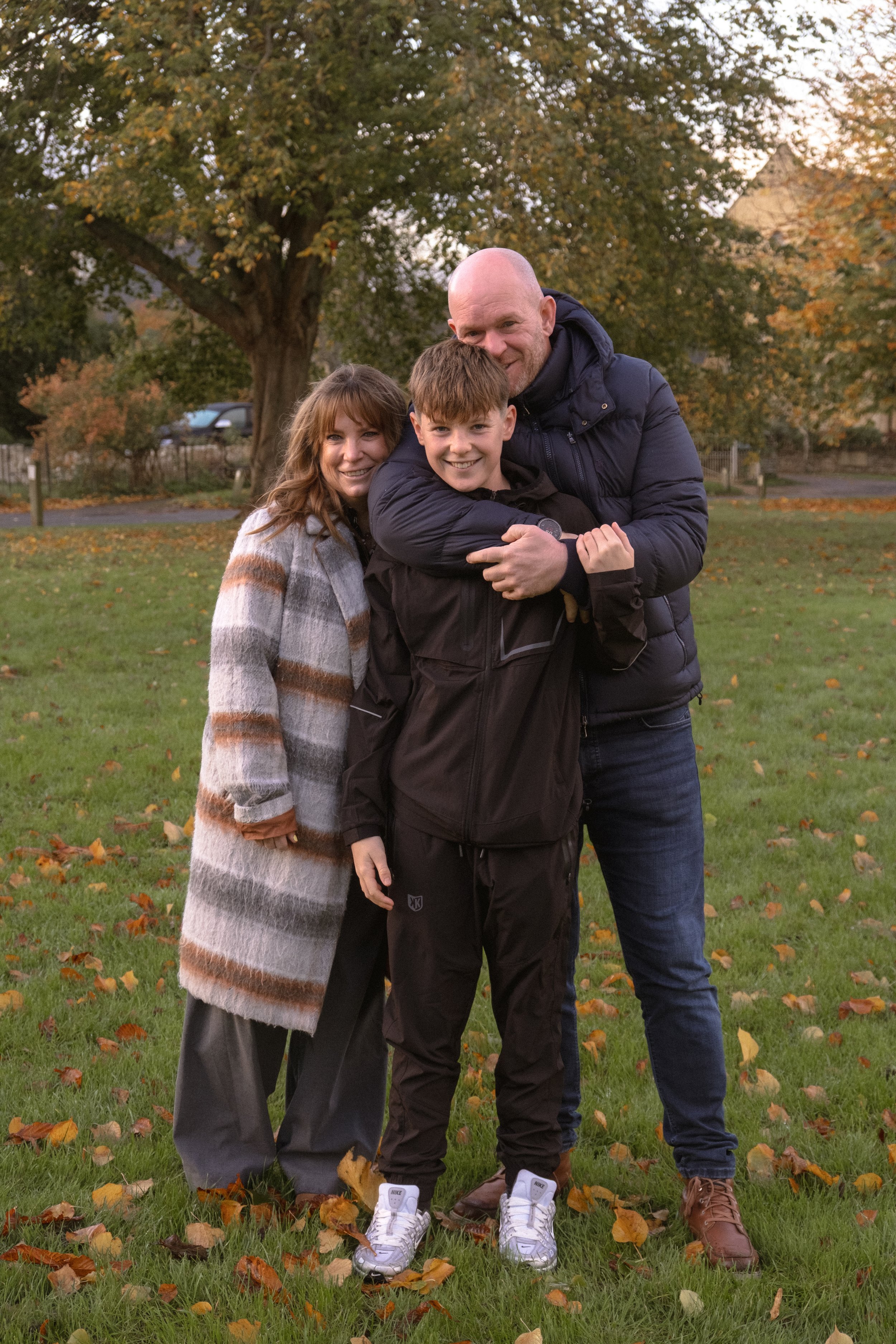 Older children and grandparents family portraits in Kingham in Oxfordshire. Cotswolds family portrait photographer. Autumn family photoshoot