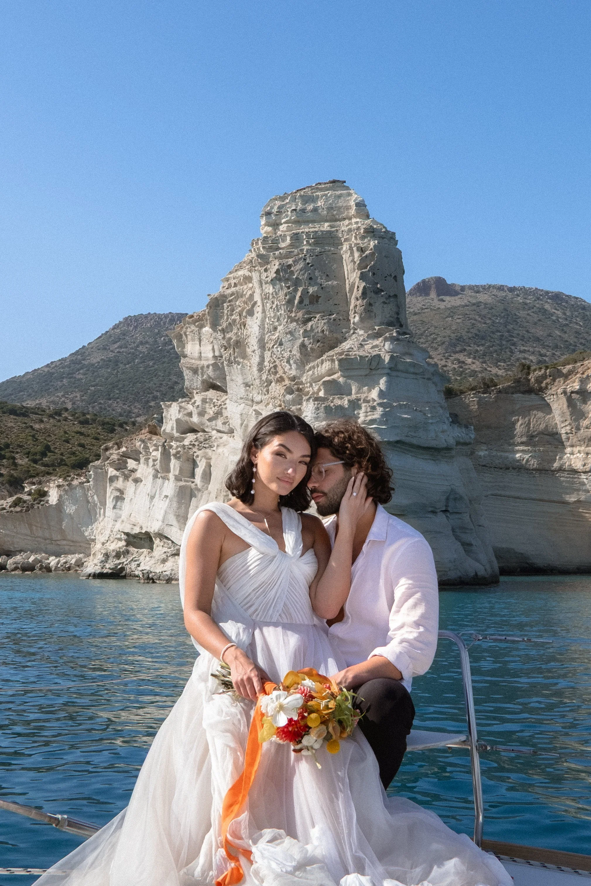 Sailing adventure elopement on the island of Milos in Greece. Destination elopement photography