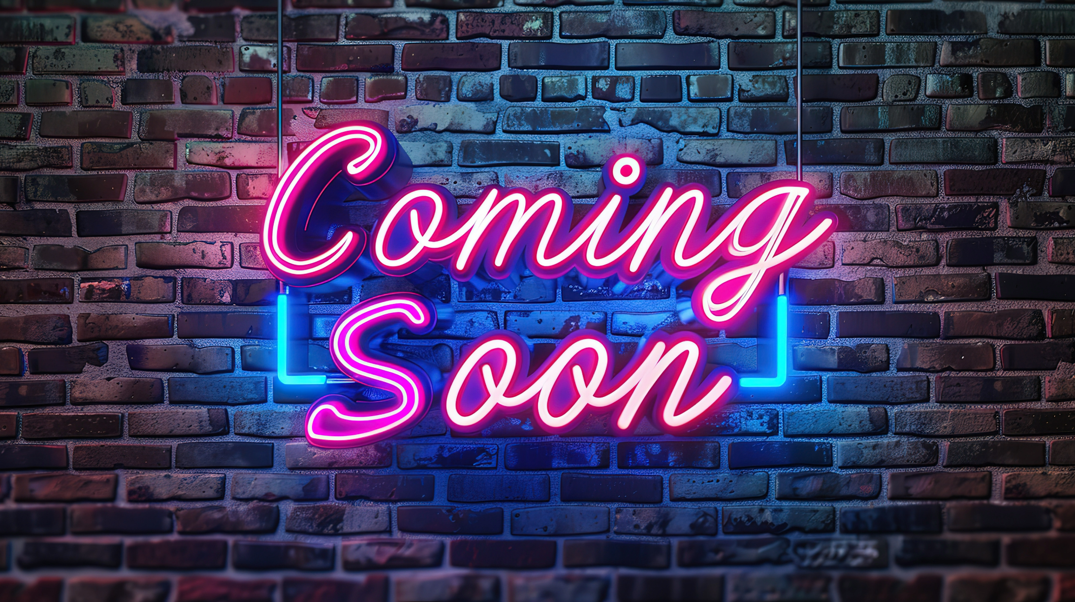 A group of women sitting around a decorated dining table at a celebration, smiling and enjoying food and drinks in a warmly decorated room with fairy lights and pink flowers.