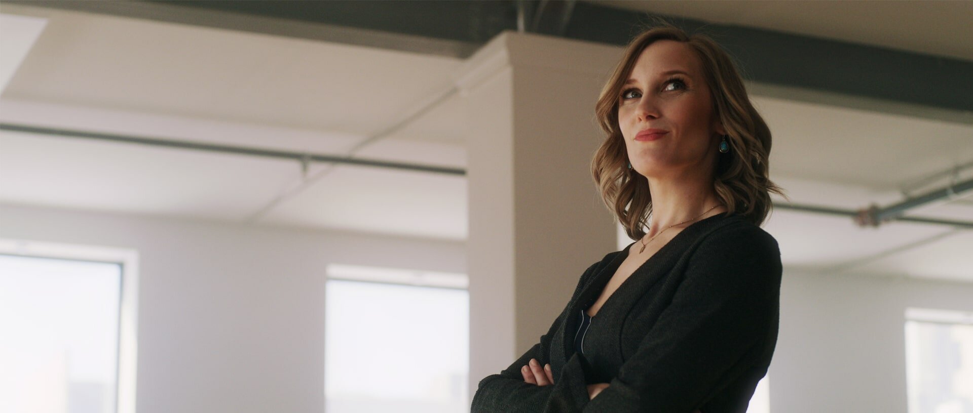 Businesswoman looking around new space