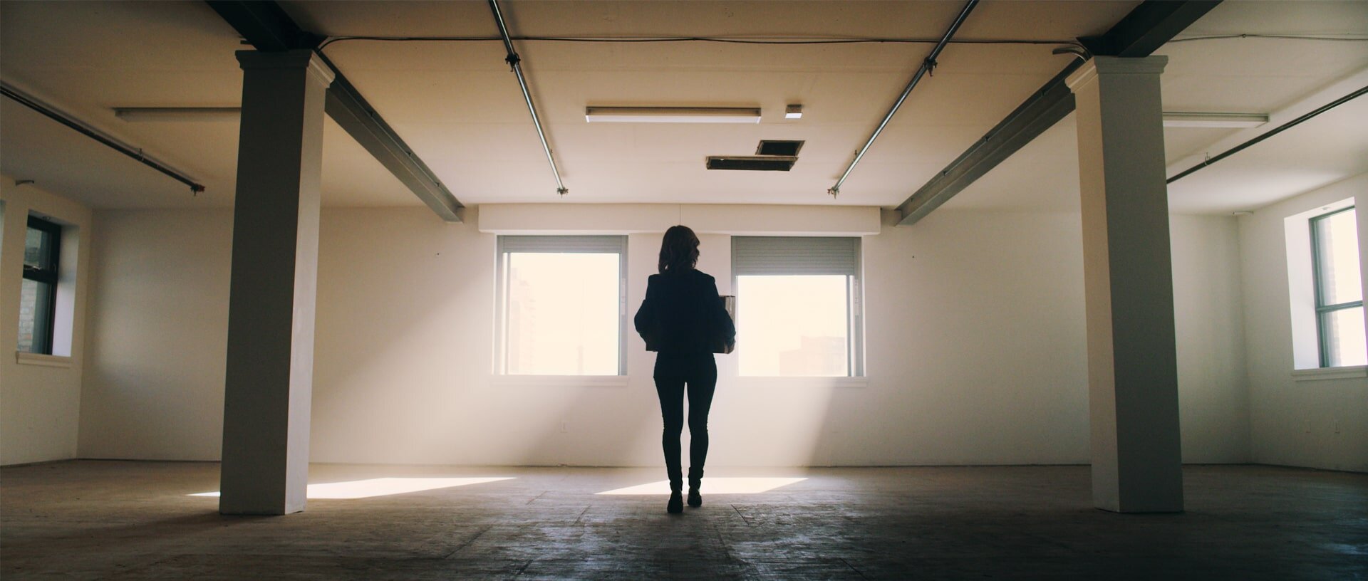 Businesswoman moving into new office space