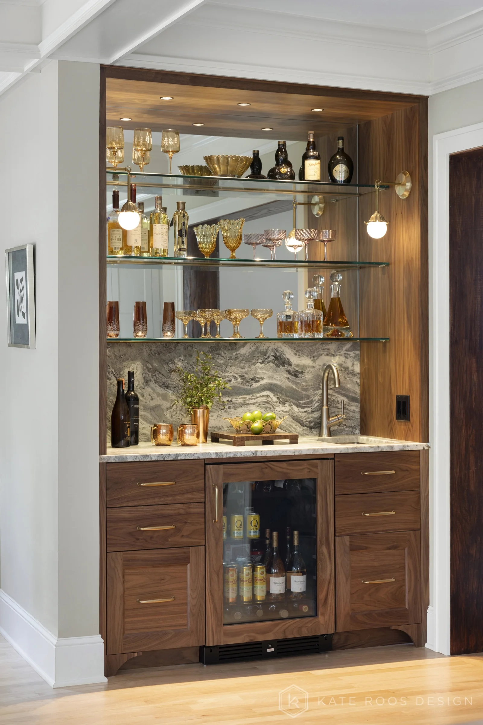 A beautiful balance of traditional architecture and modern functionality, the Christie Kitchen is a study in thoughtful details, refined materials, and timeless design.

Warm white custom cabinetry, an architectural coffered ceiling, and delicate pat