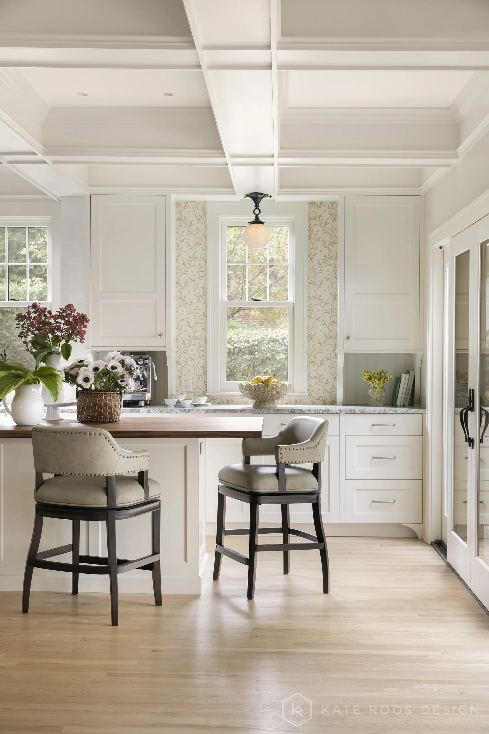 A beautiful balance of traditional architecture and modern functionality, the Christie Kitchen is a study in thoughtful details, refined materials, and timeless design.

Warm white custom cabinetry, an architectural coffered ceiling, and delicate pat