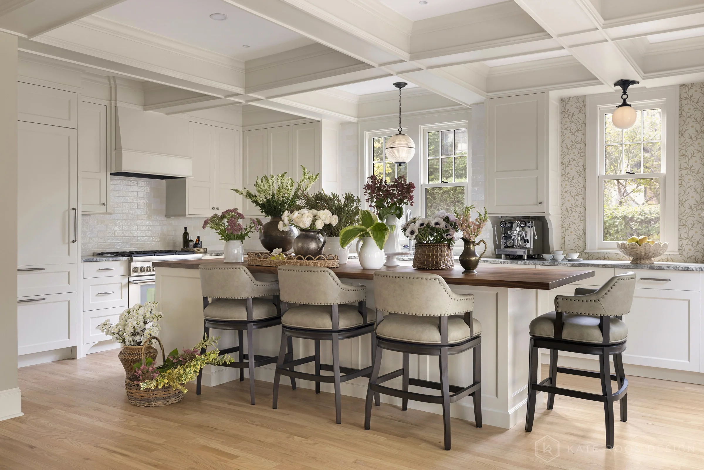 A beautiful balance of traditional architecture and modern functionality, the Christie Kitchen is a study in thoughtful details, refined materials, and timeless design.

Warm white custom cabinetry, an architectural coffered ceiling, and delicate pat