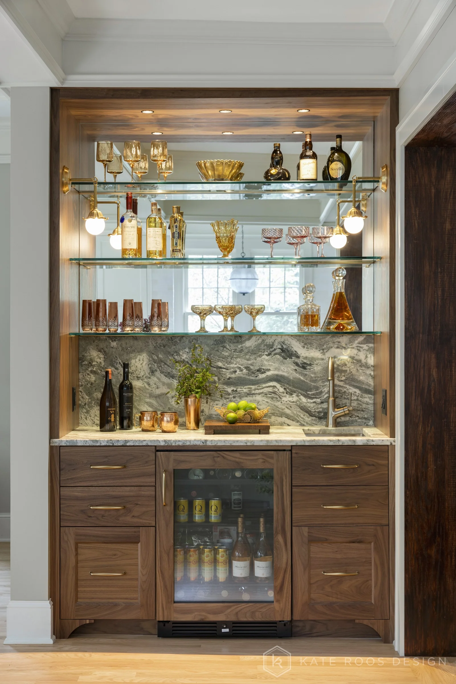 A beautiful balance of traditional architecture and modern functionality, the Christie Kitchen is a study in thoughtful details, refined materials, and timeless design.

Warm white custom cabinetry, an architectural coffered ceiling, and delicate pat