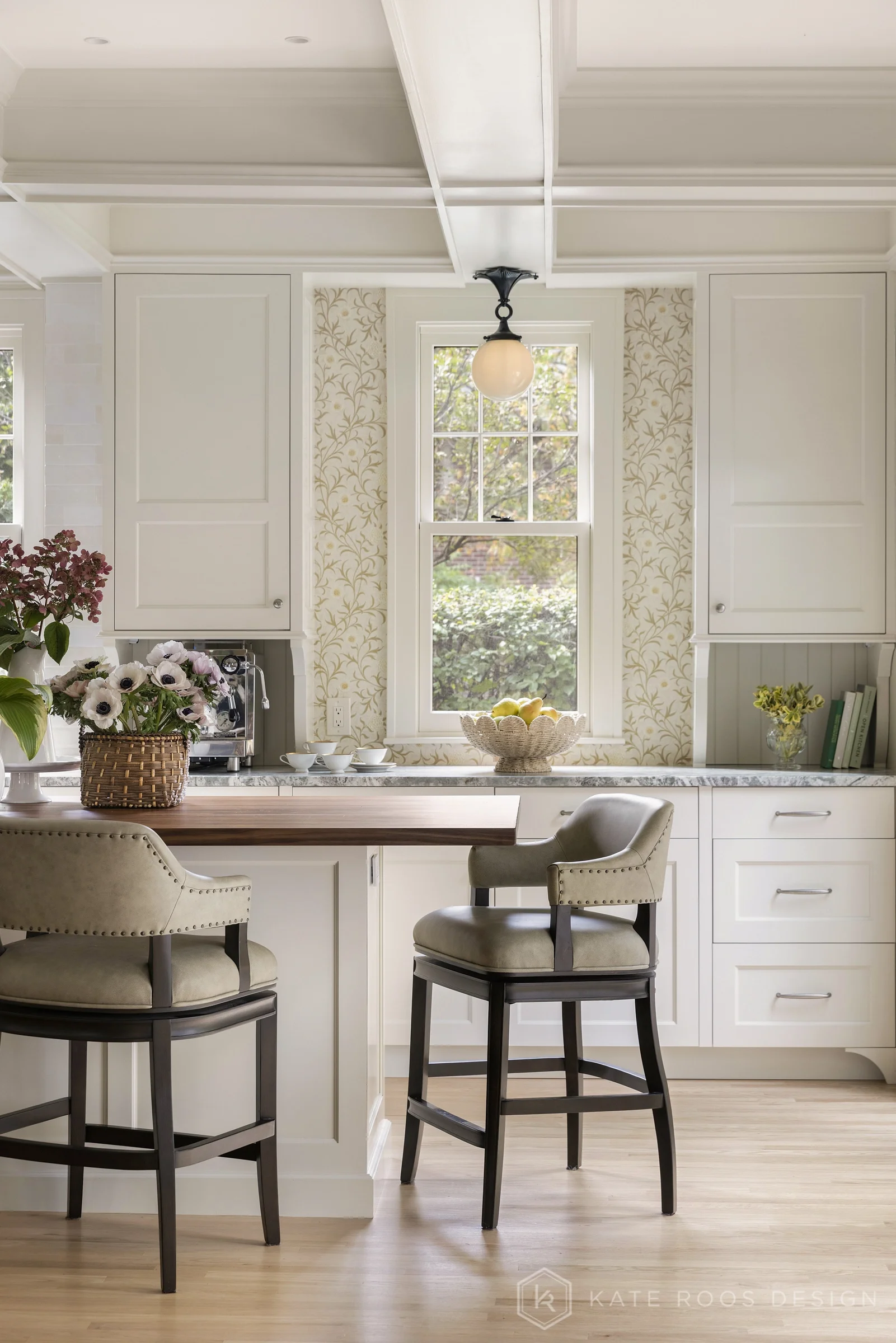 A beautiful balance of traditional architecture and modern functionality, the Christie Kitchen is a study in thoughtful details, refined materials, and timeless design.

Warm white custom cabinetry, an architectural coffered ceiling, and delicate pat