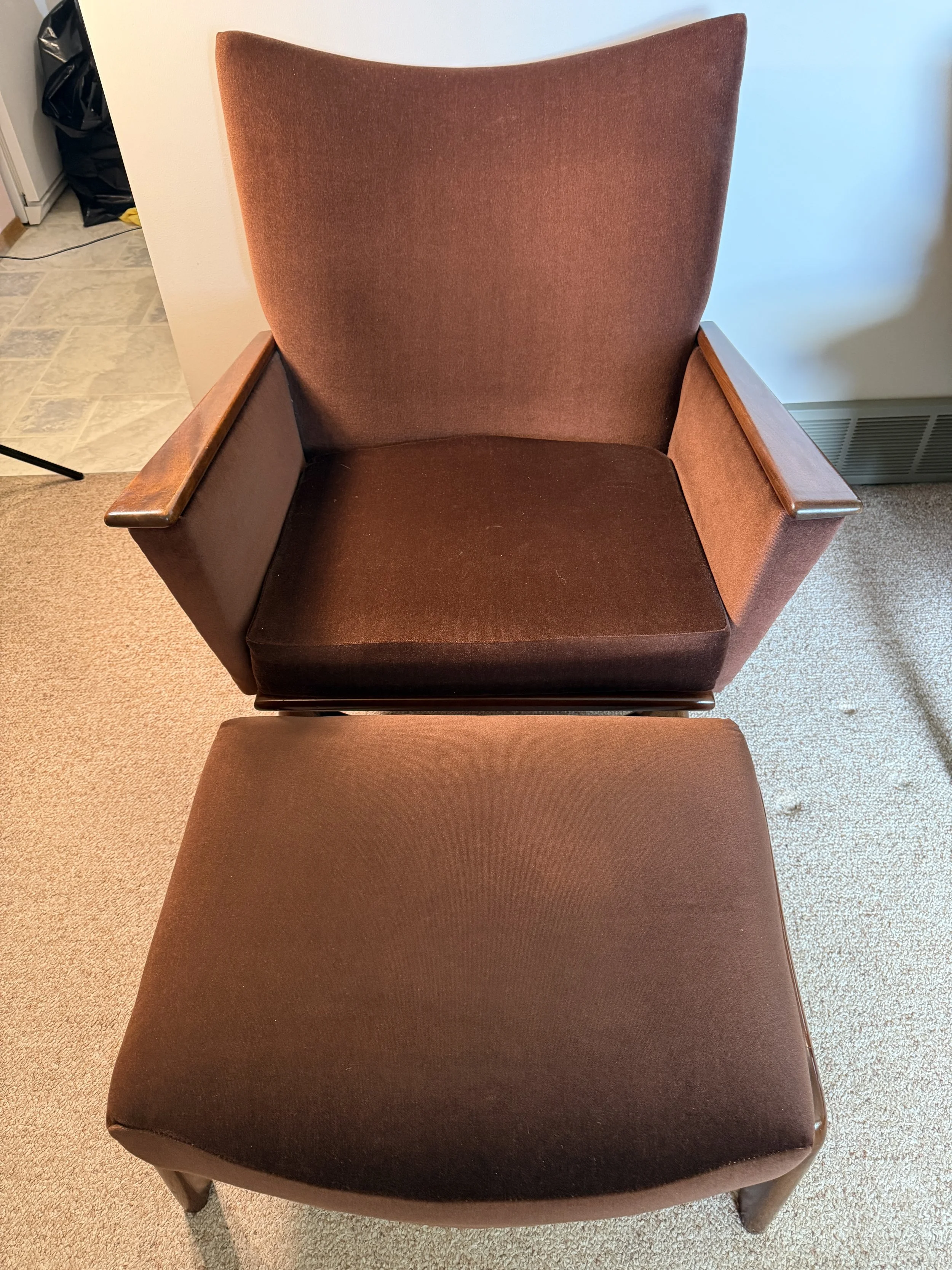 216.  Vintage Mid Century modern lounge armchair with matching ottoman, brown velvet with wooden paddle arms. c196031x24x33"