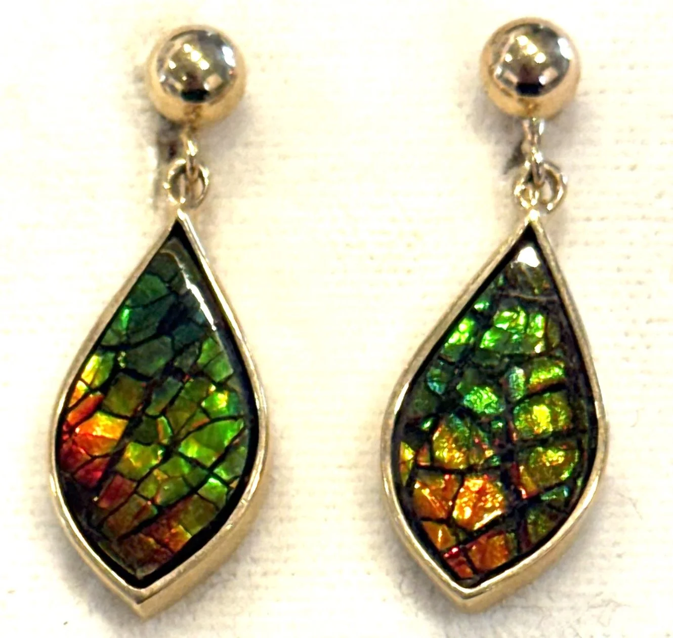 251.  Pair of Lady's polished 14K yellow gold, ammolite screw-on, drop earrings, 5.25 grams, stamped 14K, in very good condition.  Appraisal Certificate included Value $1690.
