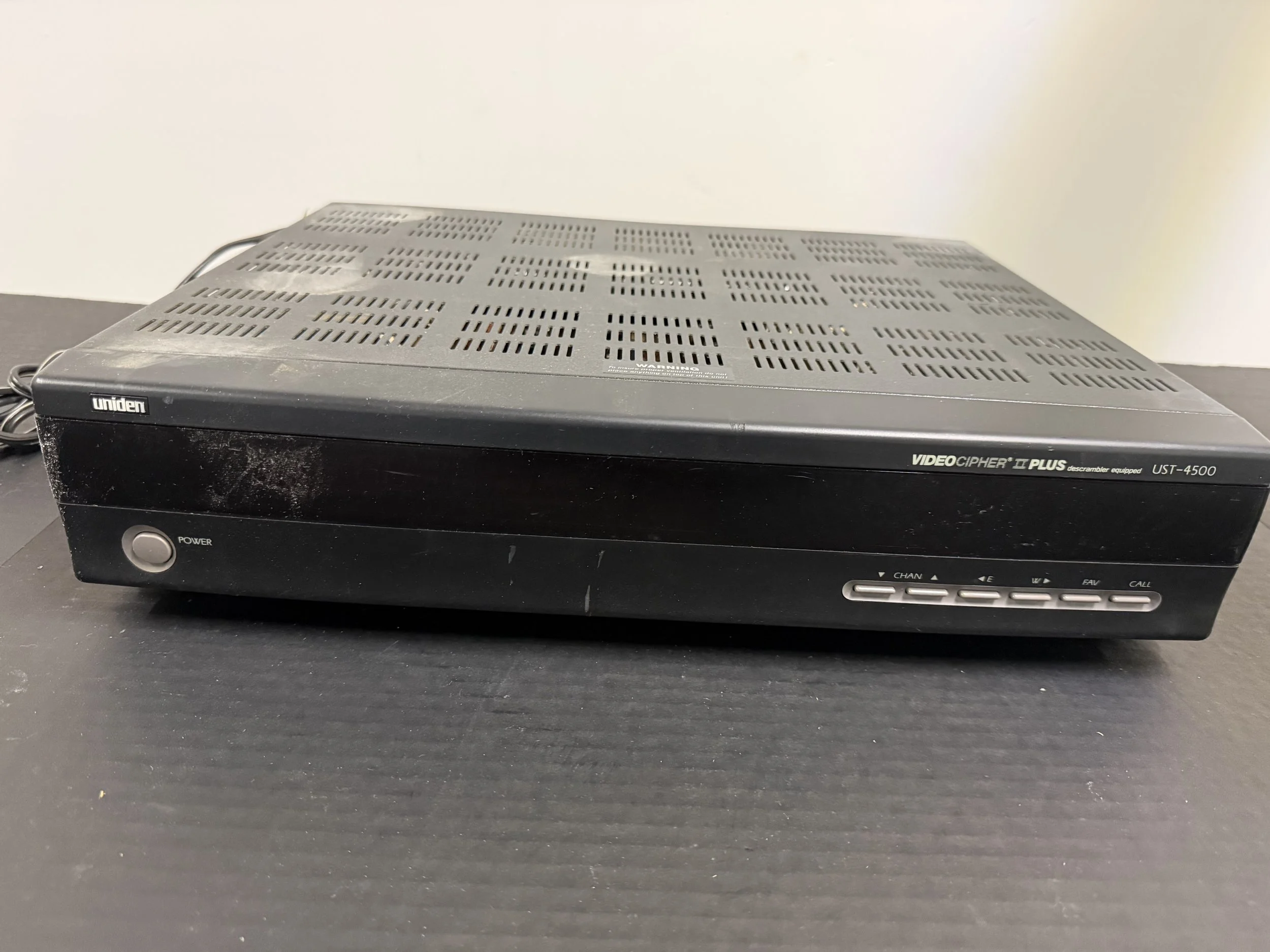 153.  Uniden video cipher II plus descrambler equipped UST-4500, not tested, as is smoking environment