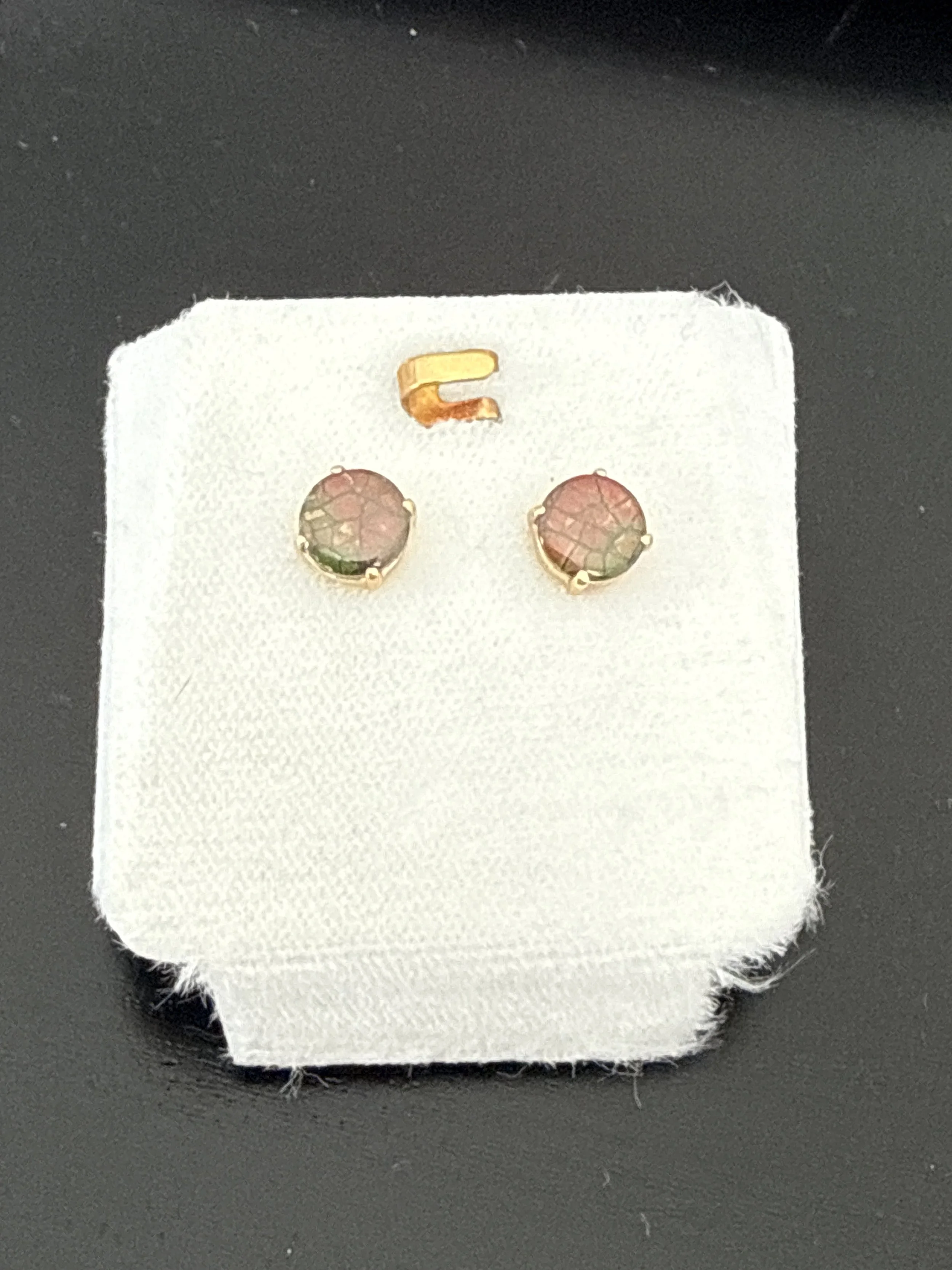 268.  Two 7.0mm flat polished Ammolite Triplets set in 14K, 1.9 grams, verbal appraisal $700