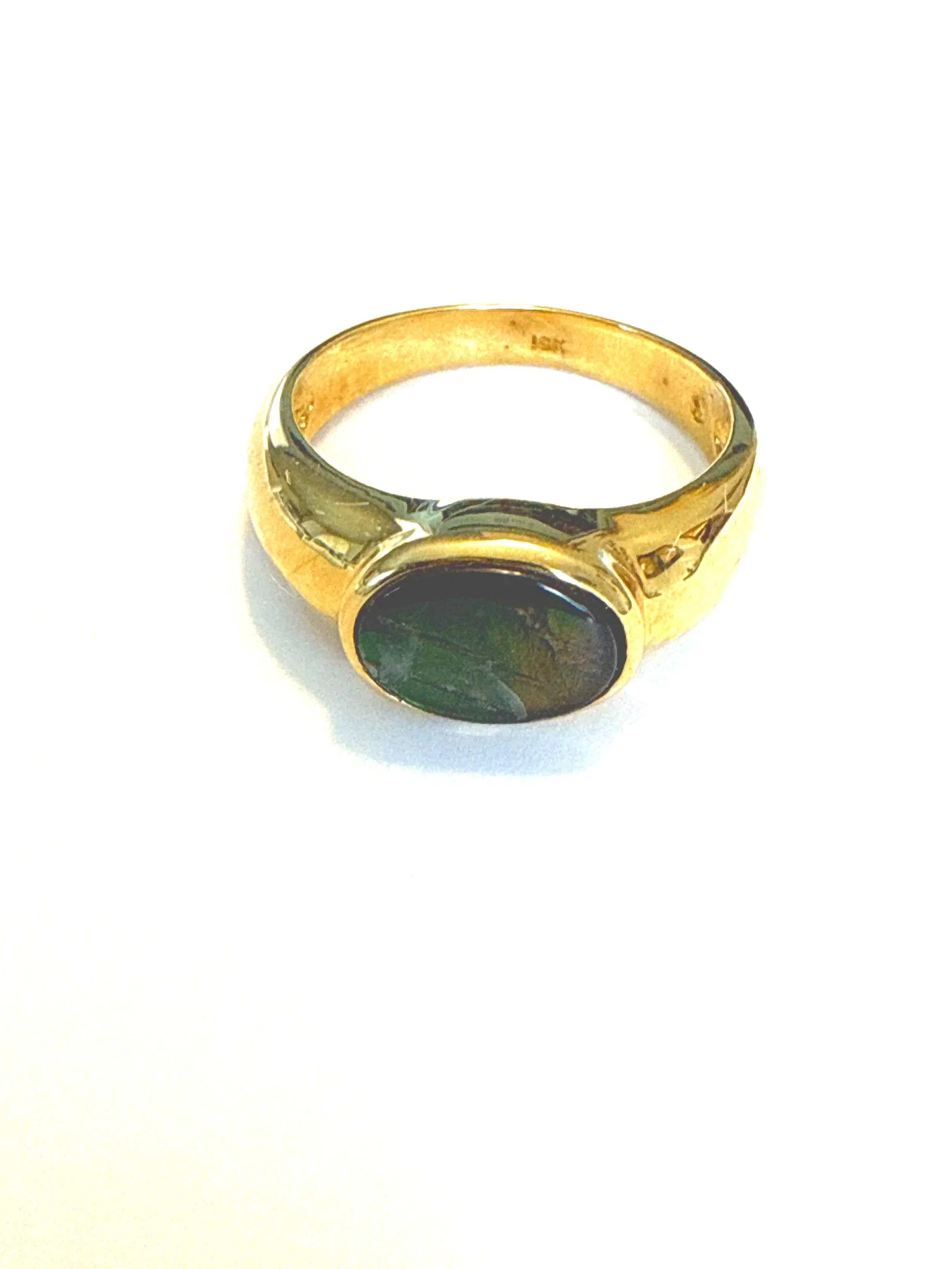 254.  Lady's polished 18K yellow gold, ammolite triplet ring, size 6.5, 4.87 grams, stamped 18K, in good condition.  Appraisal Certificate included Value $1800