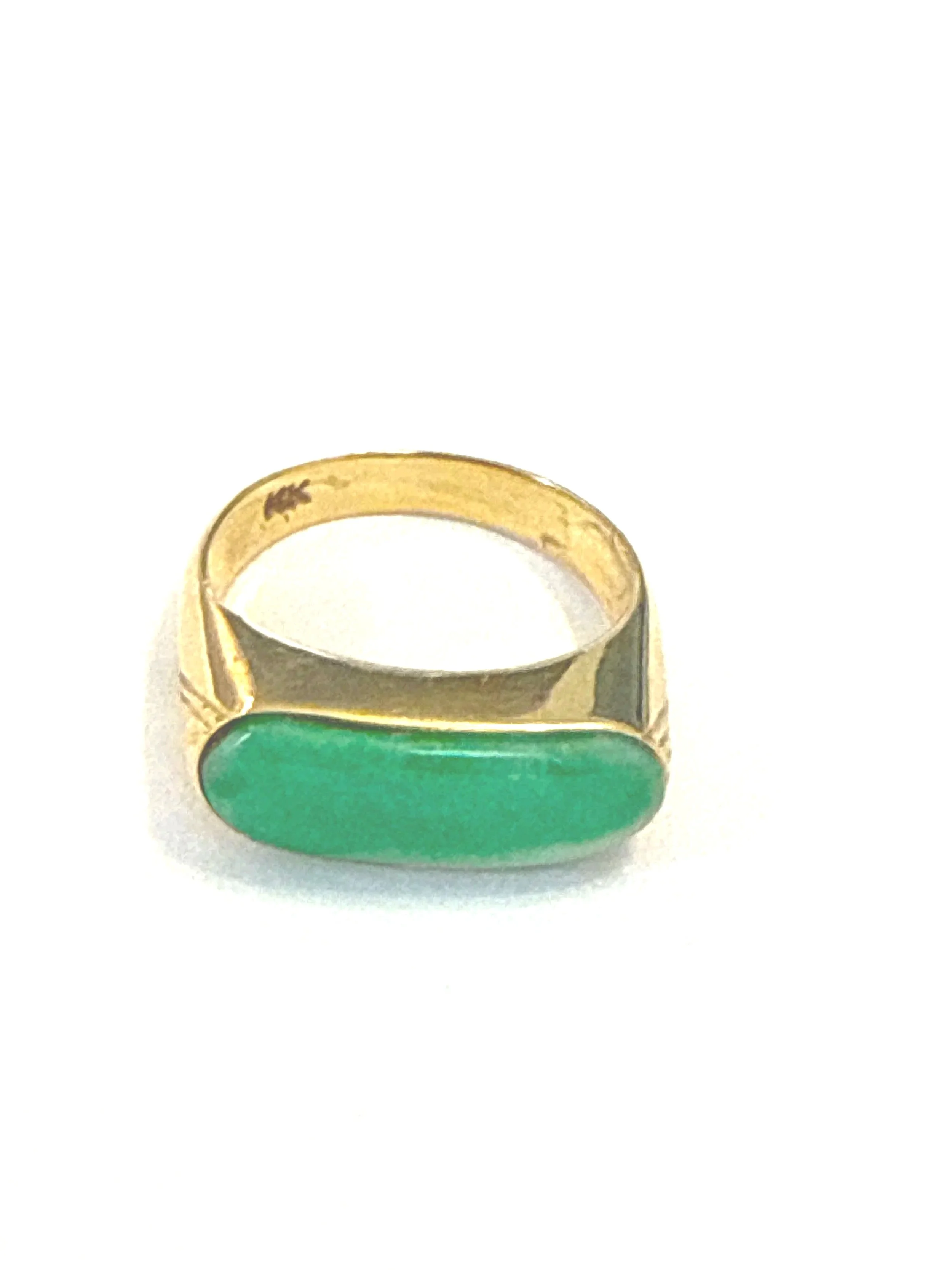 270.  Lady's manufactured polished 14K yellow gold, jadeite ring, size 5.5, 2.88 grams, stamped 14K in very good condition
