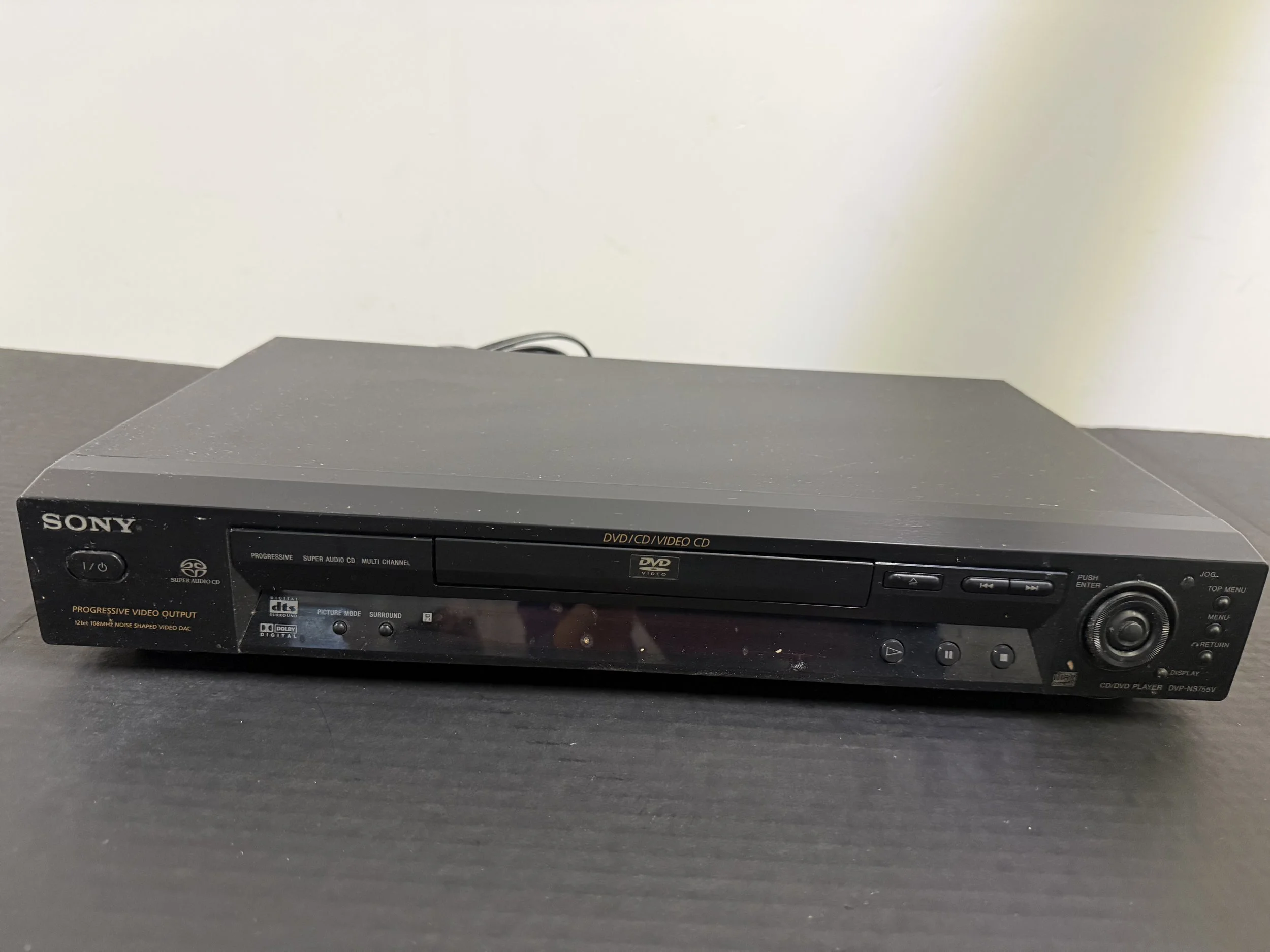 165.  Sony DVD/CD/Video CD player, DVP-NS755V, not tested, as is smoking environment