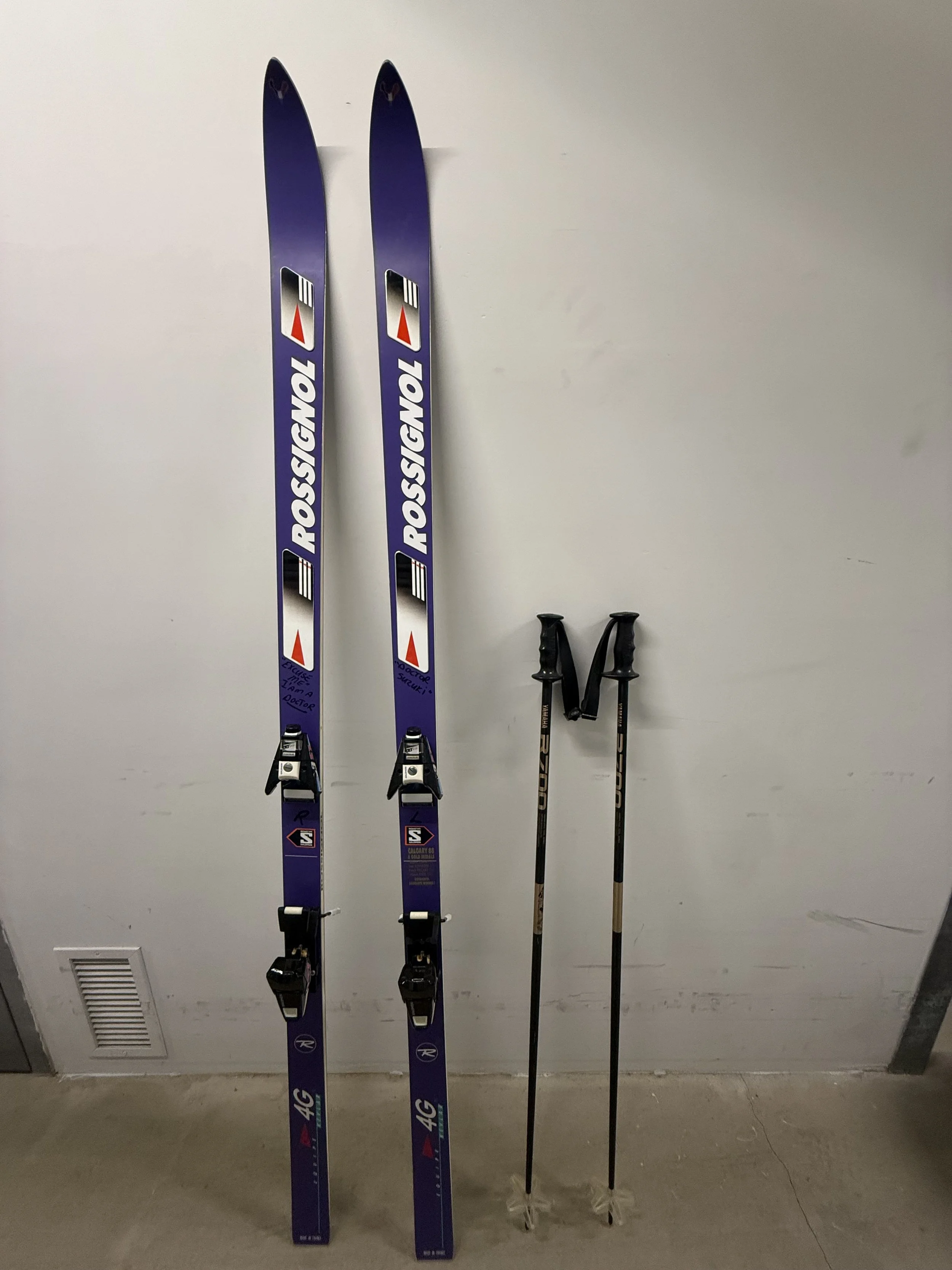 133.  Rossignol Equipe Kevlar 4G downhill skis (79"L), Saloman 957 bindings and Yahama poles