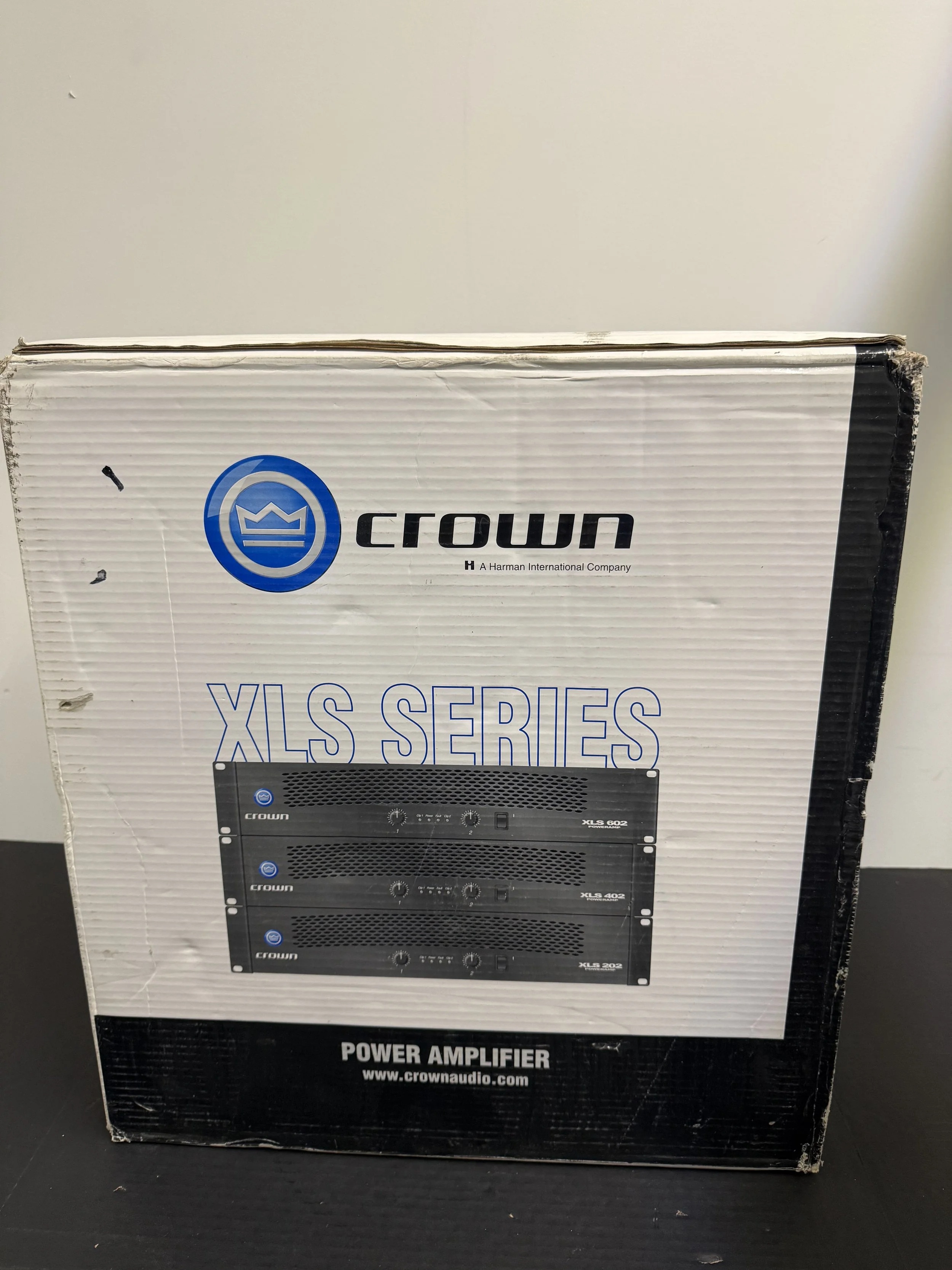 195.  Crown XLS 202 power amp, new in box, not tested, as is smoking environment