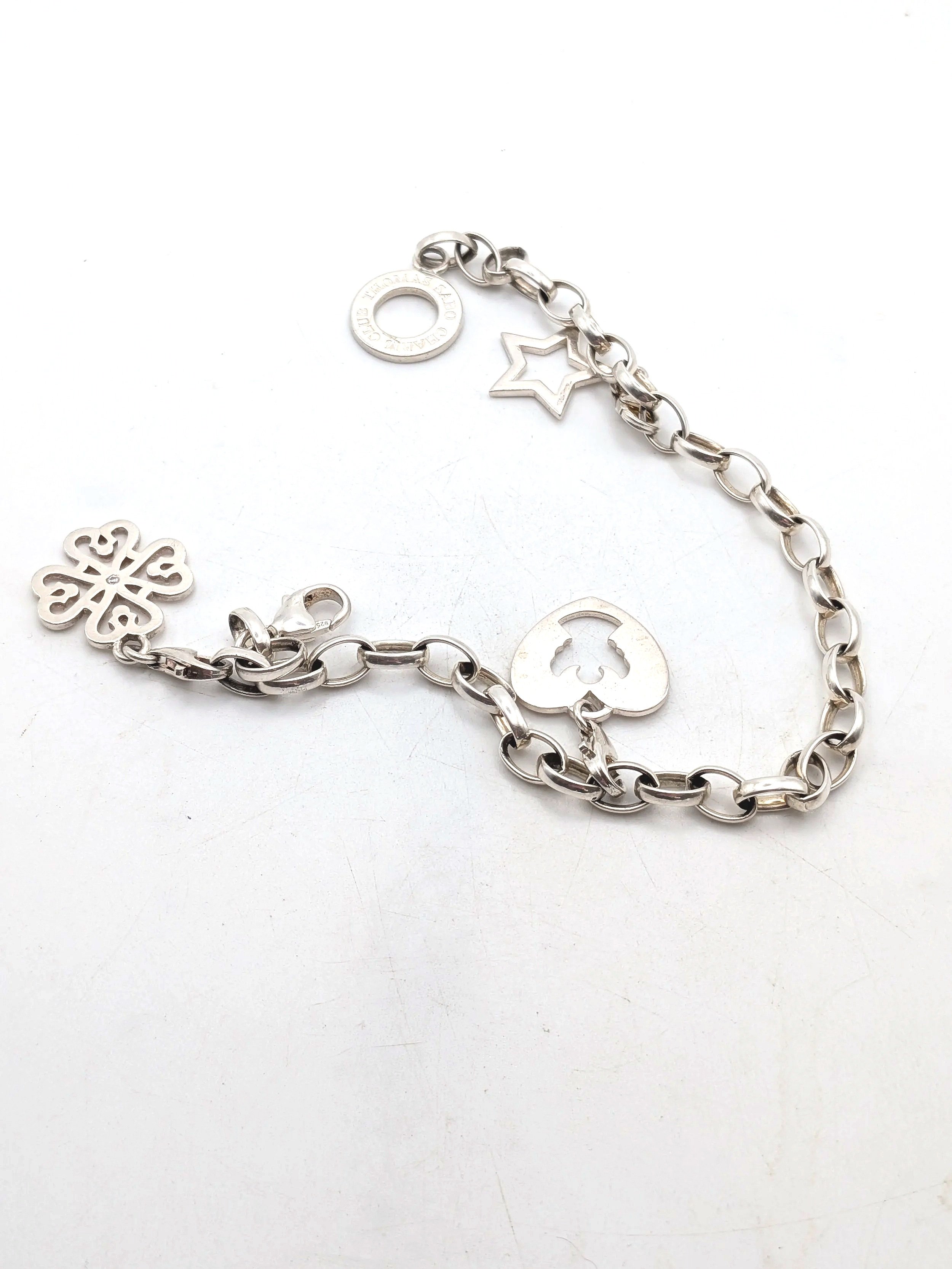 499.  Thomas Sabo Charm Club bracelet 13.64 gm 7-8"